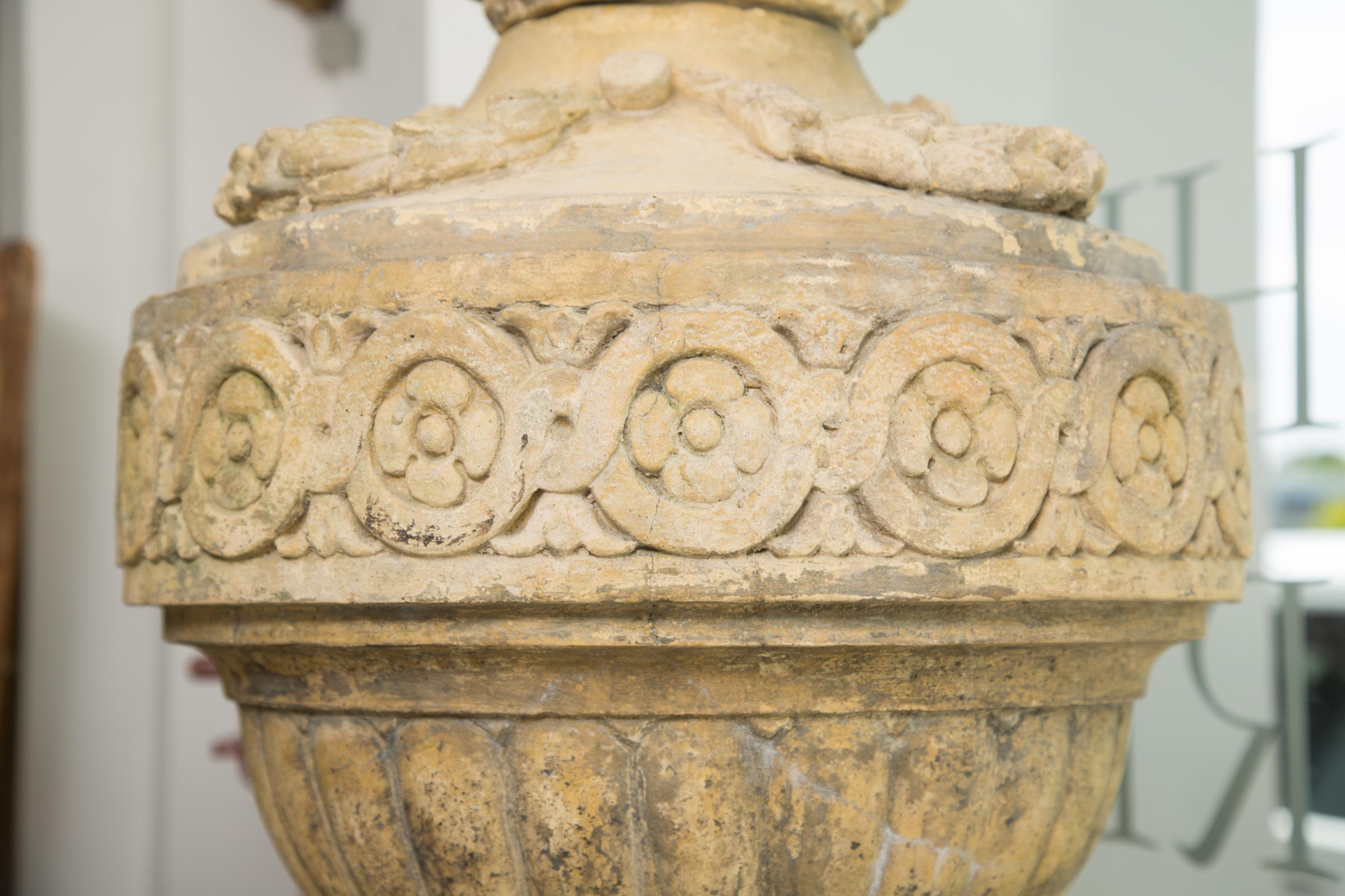 Cast Stone Pair of Stone Cast English Urns on Faux Marble Pedestals