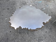 Pair of stone cast Lava Rock with Brushed steel top side table