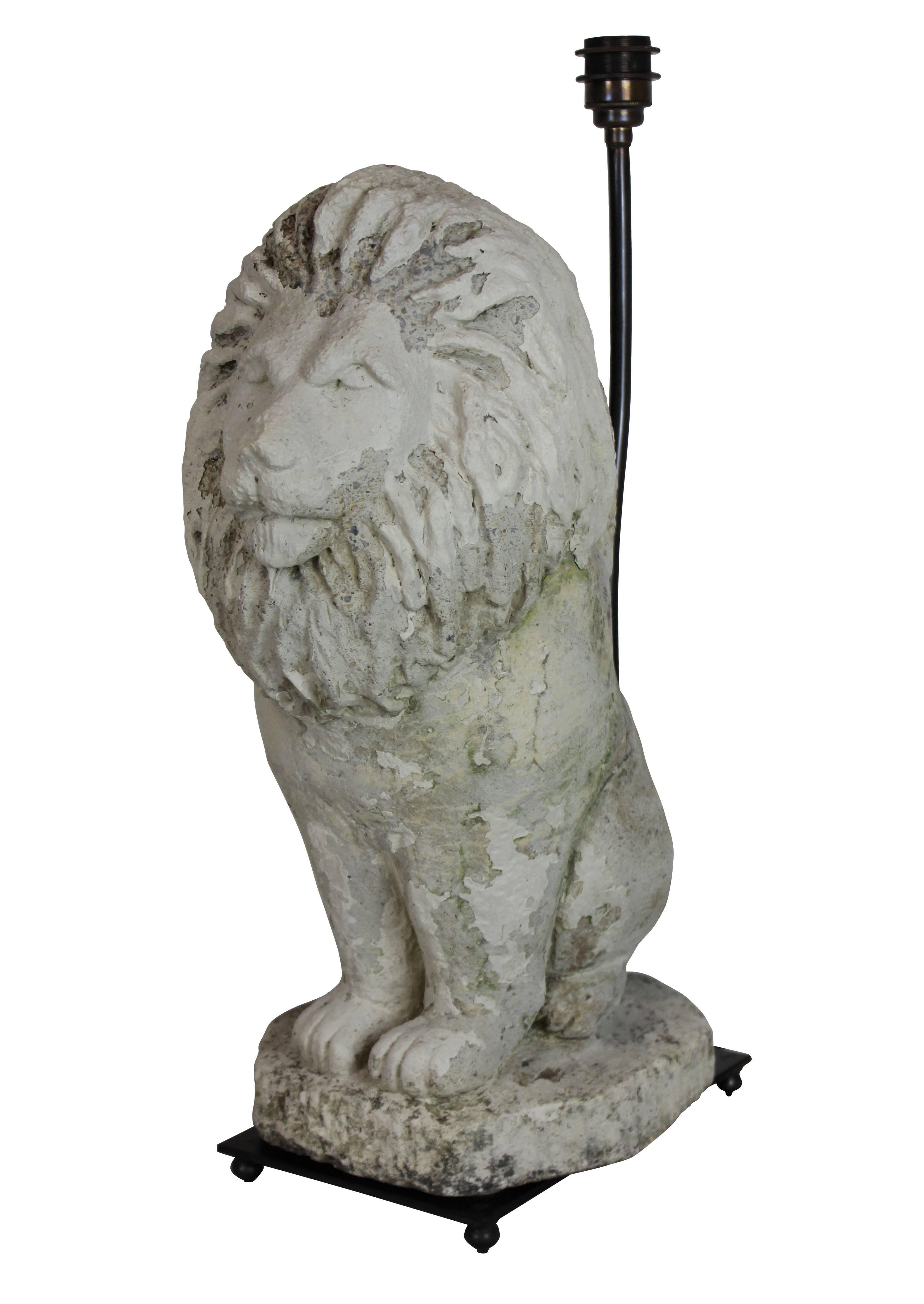 A pair of reconstituted stone lions as lamps, with bronze fittings. Note these are very heavy.
 