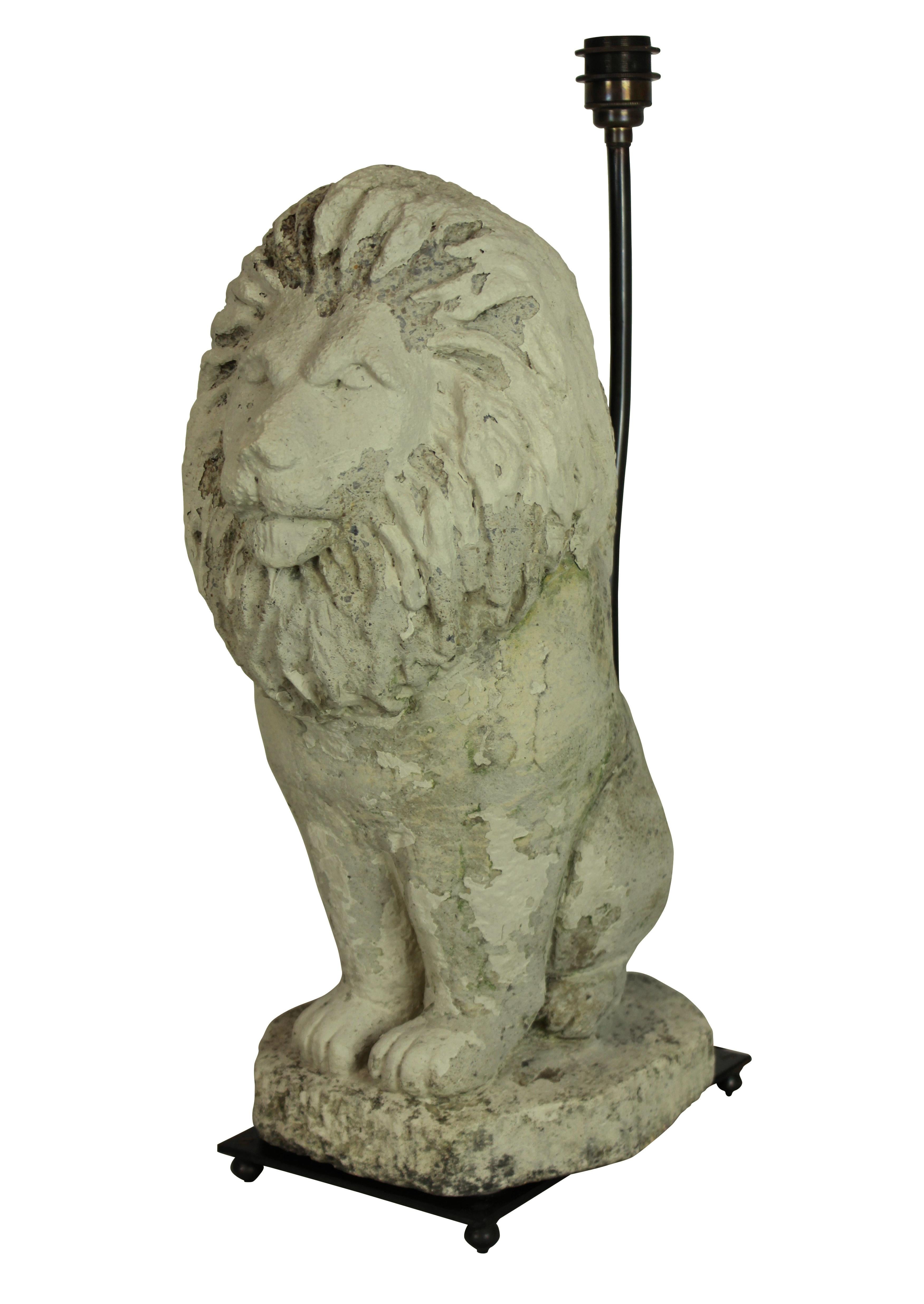 A pair of reconstituted stone lions as lamps with bronze fittings. Note these are very heavy.
 