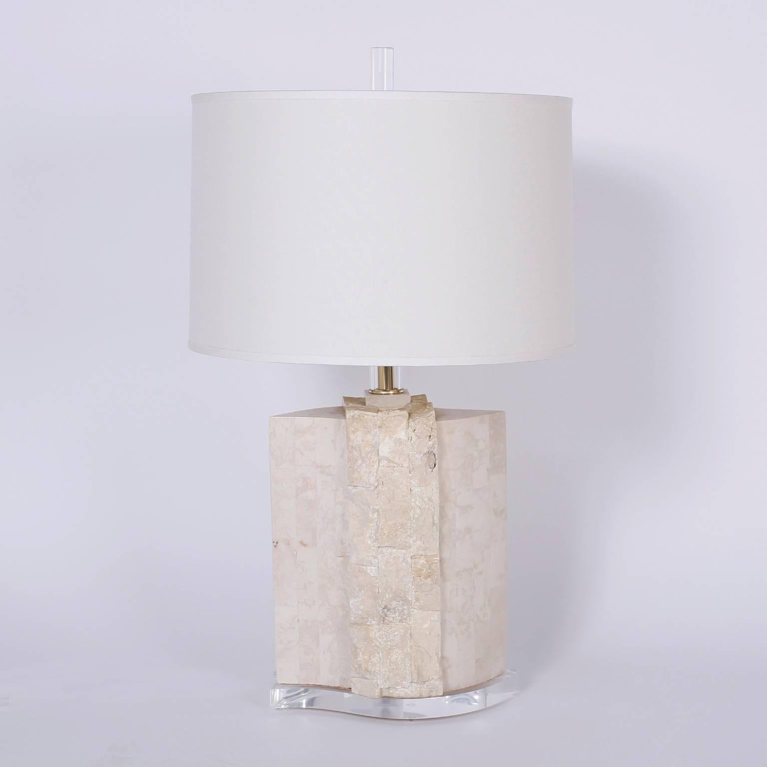 Chic midcentury pair of table lamps crafted in blocks of stone both polished and natural. Featuring Lucite finials, stems, and bases.