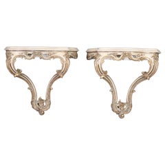Pair of Stone Top Carved French Louis XV Style Wall Mounted Consoles Pair of Stone Top Carved French Louis XV Style Wall Mounted Consoles