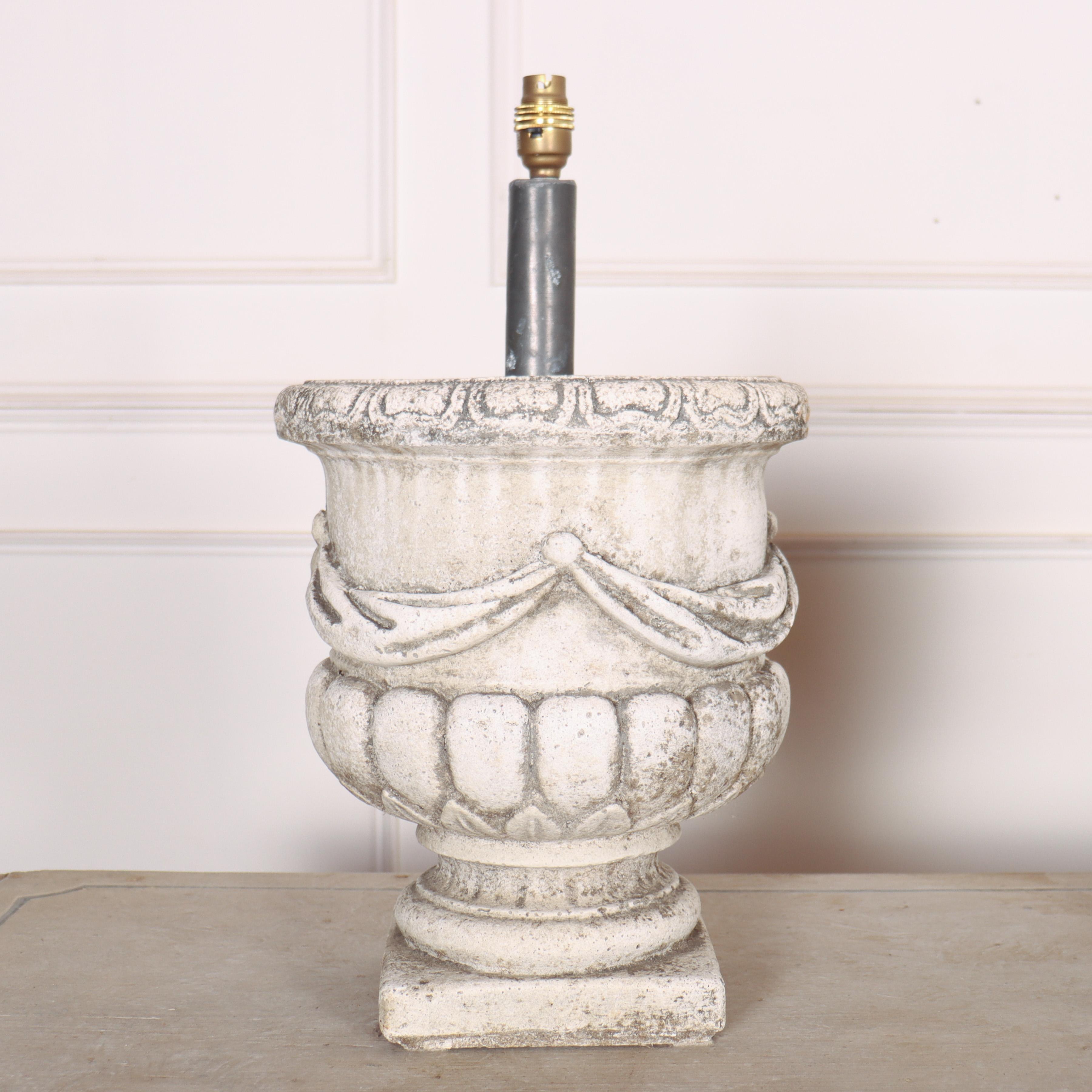Pair of 1920s reconstituted stone urn table lamps.

Reference: 8075

Dimensions
20 inches (51 cms) High
12 inches (30 cms) Diameter