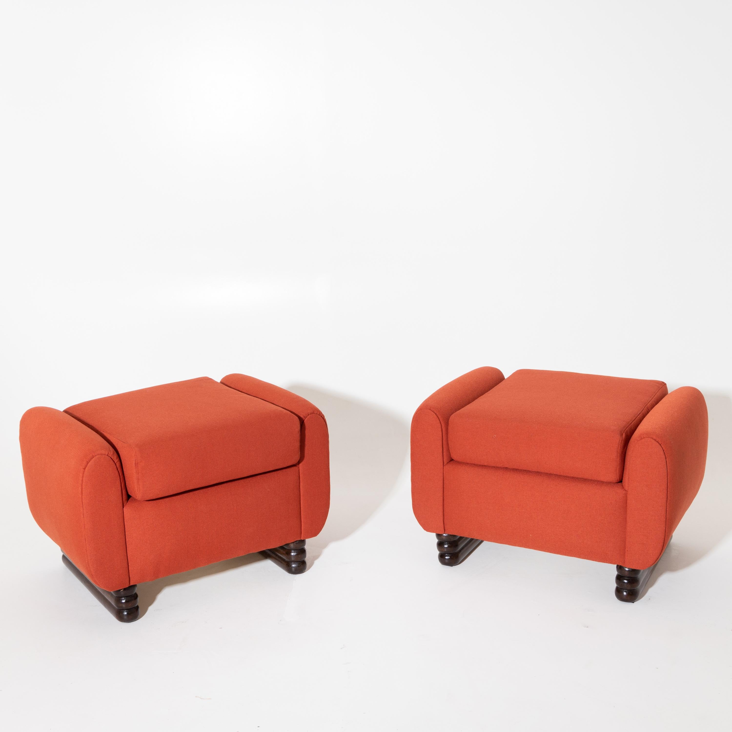 Two stools on wavy wooden legs with red-covered seats, attributed to Vittorio Valabrega.