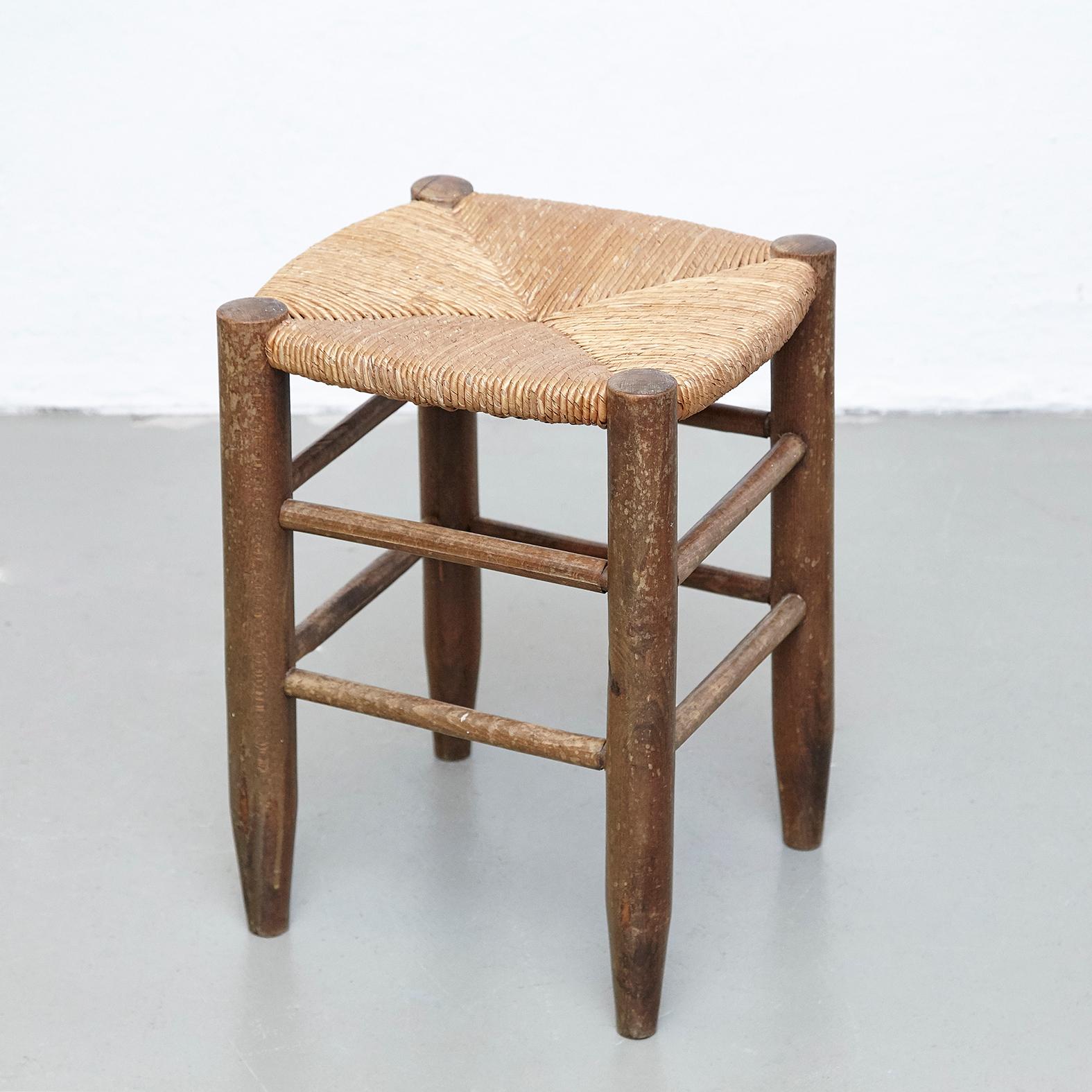 Pair of stools designed by Charlotte Perriand, circa 1950.
Manufactured in France.
Wood and rattan. 

In original condition, with minor wear consistent with age and use, preserving a beautiful patina.

Charlotte Perriand (1903-1999) She was