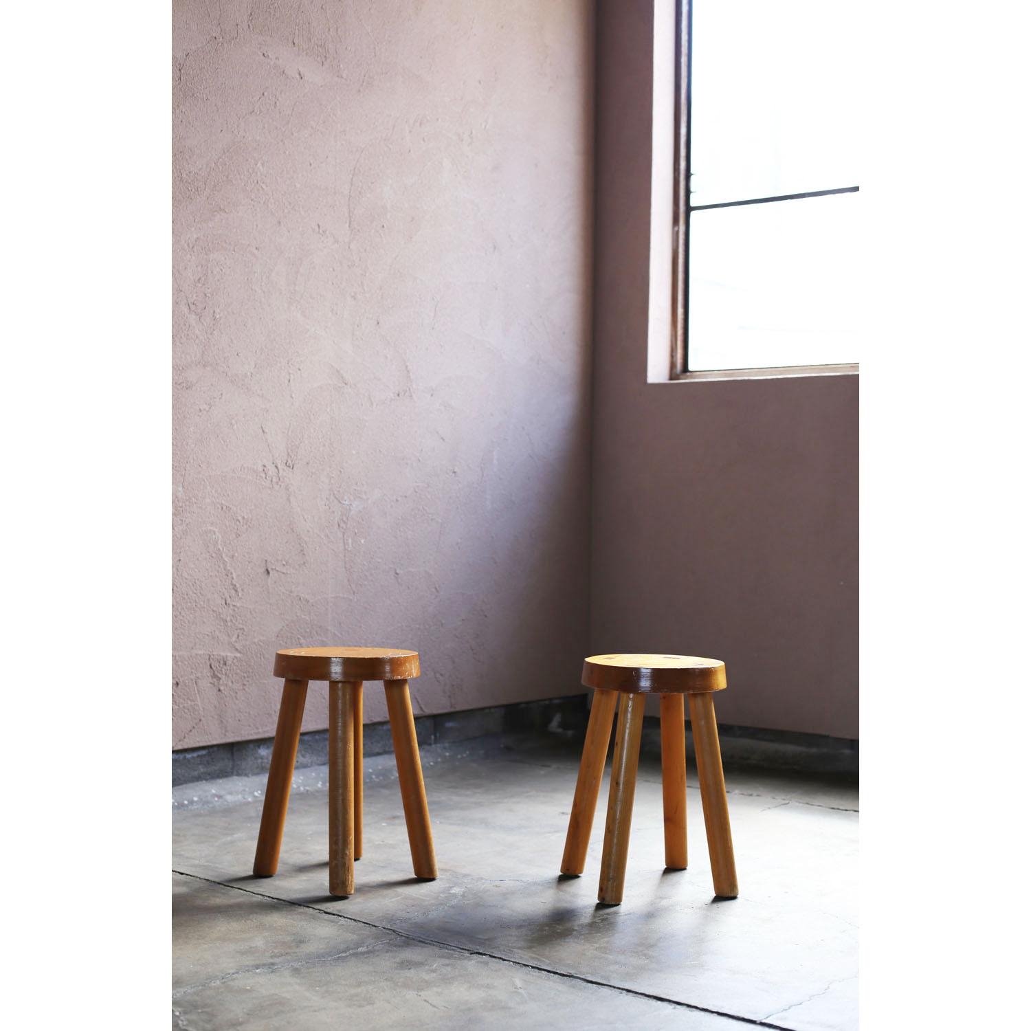 A stool designed by Charlotte Perriand for the Les Arcs ski resort around 1960.
This stool was salvaged directly from Les Arcs.
It is a circular, four-legged stool with a rectangular wooden joinery design on the top.
These are very rare vintage