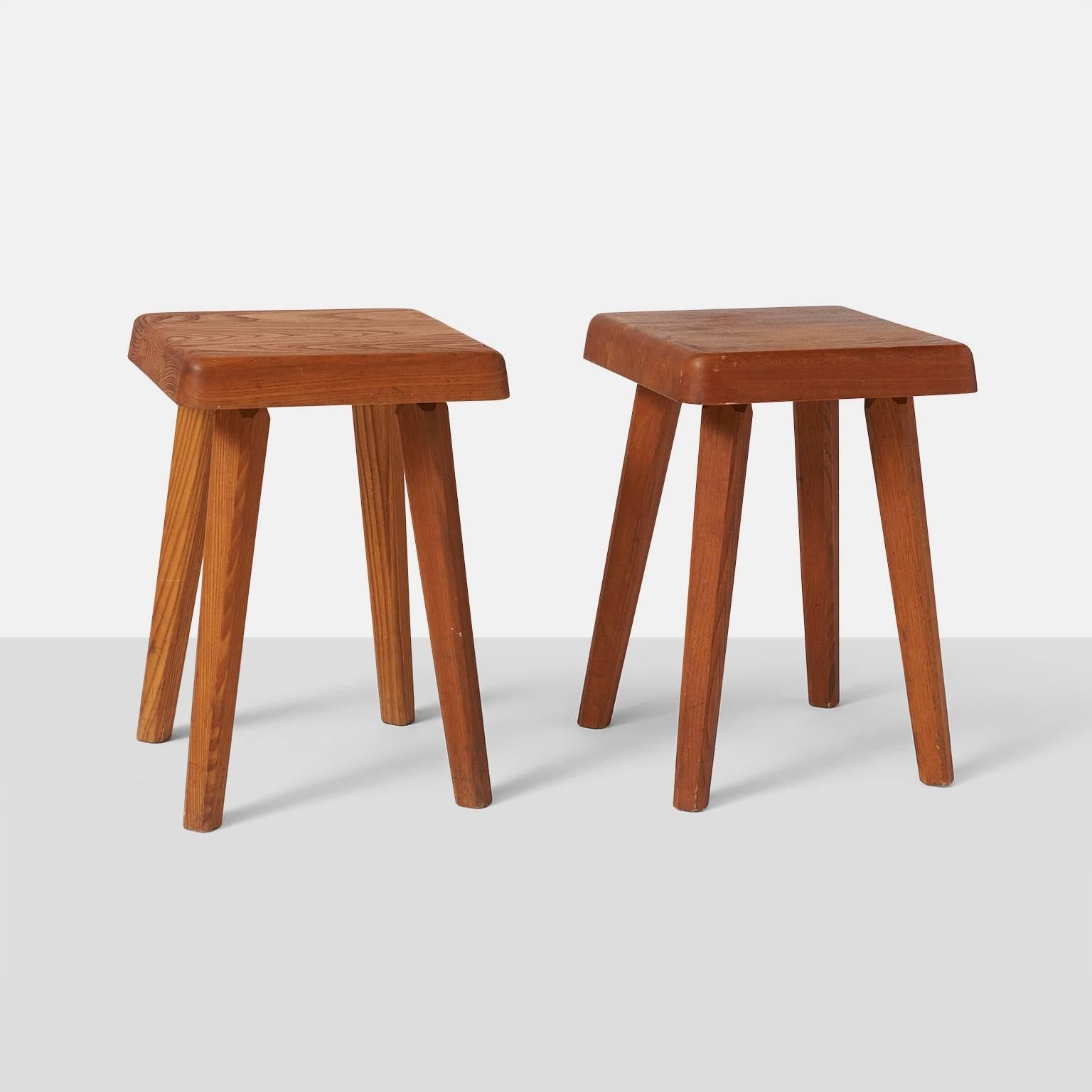 A pair of Pierre Chapo model S01A stools with a square seating. These pieces in the Campagne style are made of a rich dark and warm elm,
France, circa 1960s.