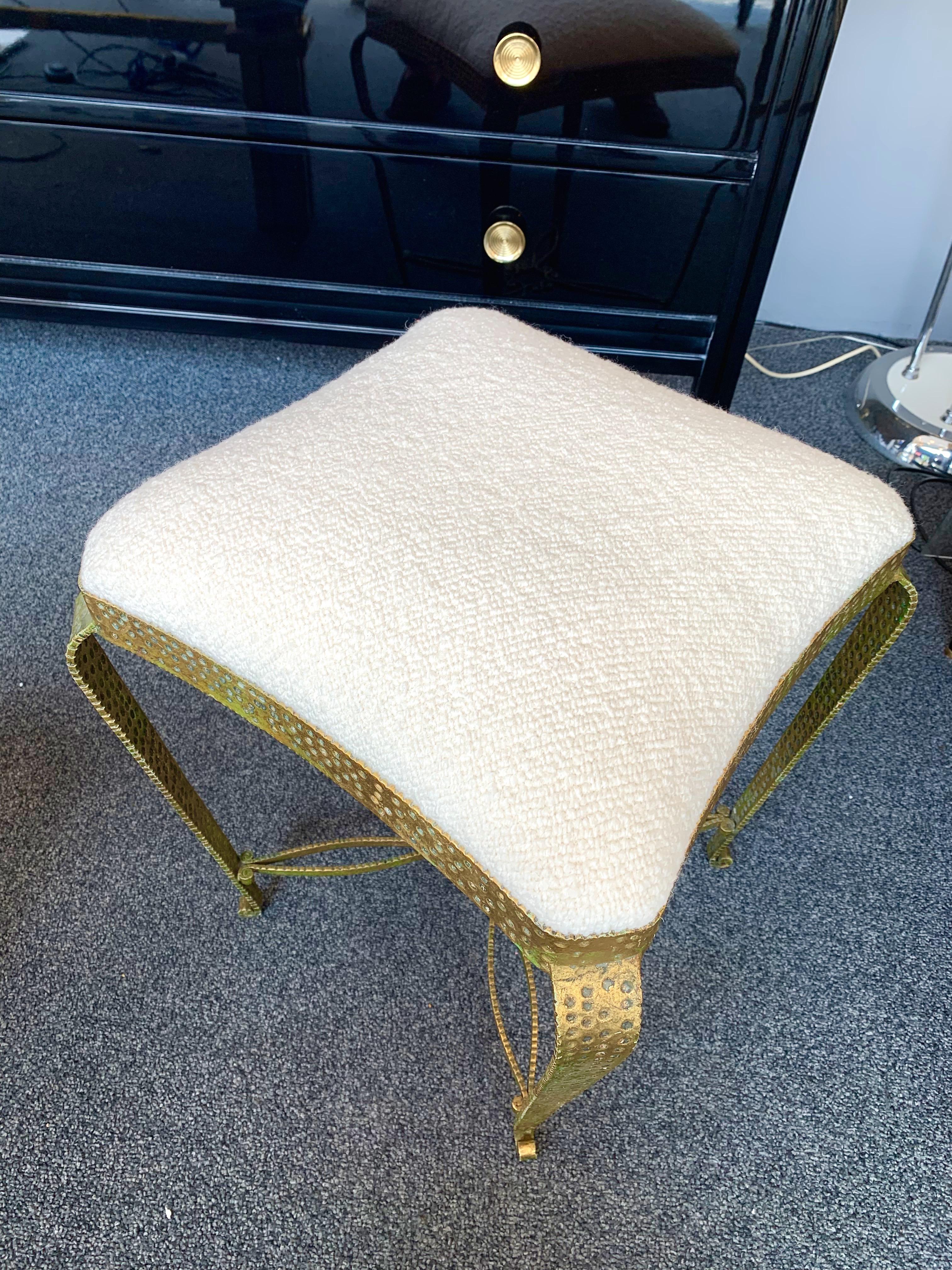 Pair of stools, poufs or ottomans by Pier Luigi Colli. Hammered wrought iron and gold leaf. Fully upholstered with Judith fabric by Pierre Frey. A bench and console table are available on my storefront. Famous design like Maison Jansen, Bagues,