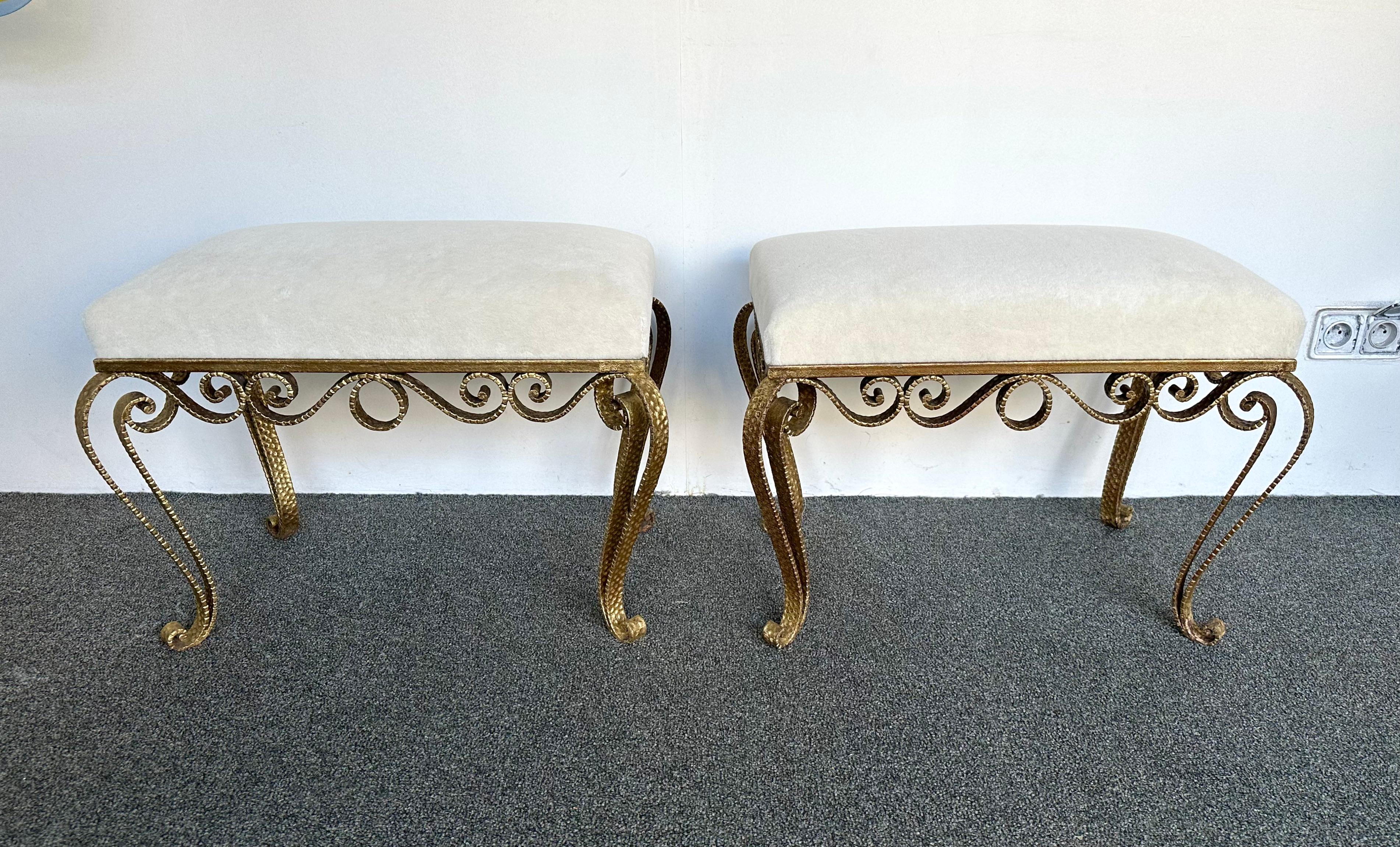 Large version of Pair of stools, poufs or ottomans by Pier Luigi Colli. Hammered wrought iron and gold leaf. Fully upholstered with alpaca mohair fabric. Famous design like Maison Jansen, Baguès, Gilbert Poillerat, Raymond Subes, Thibier, Art Deco,