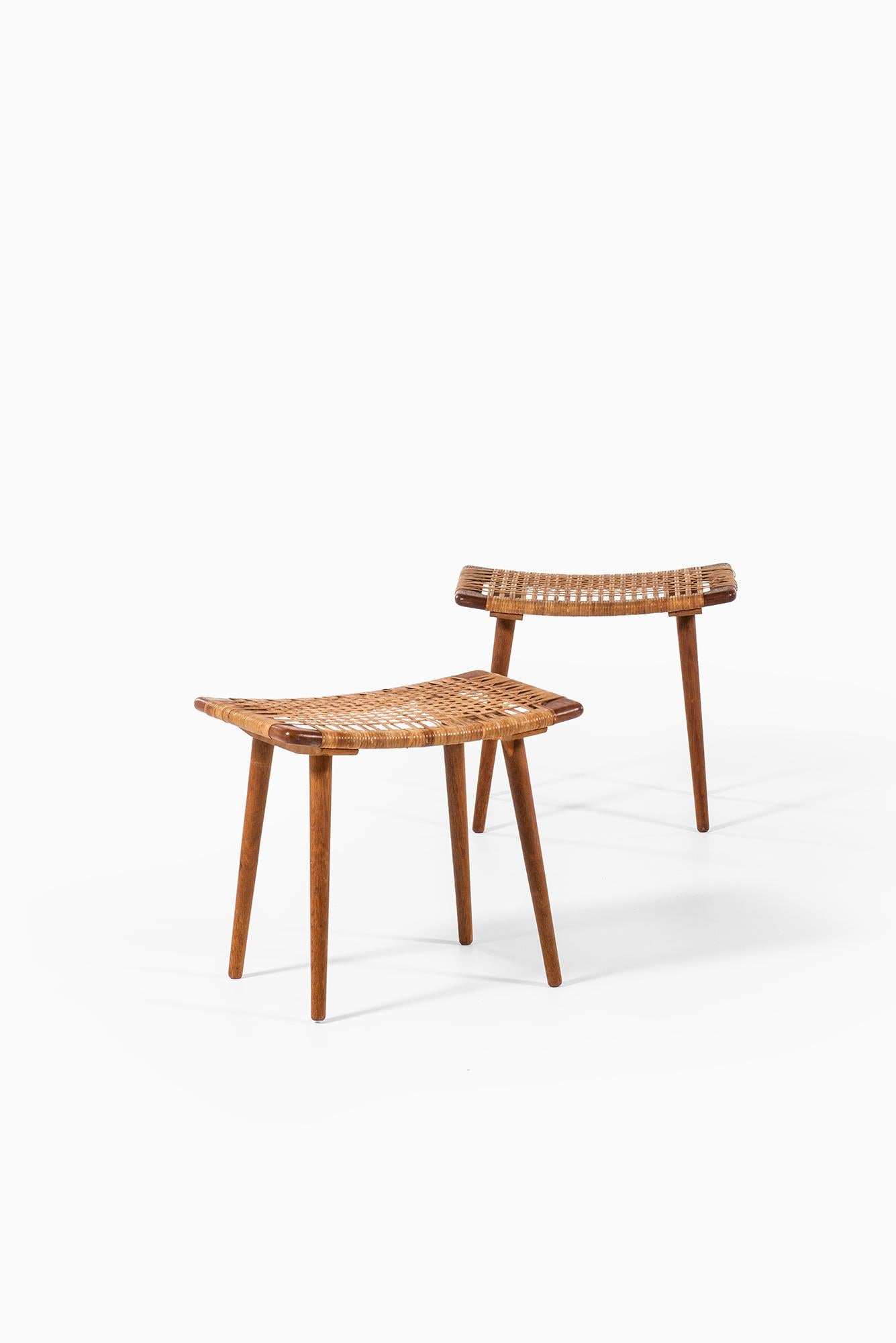 Scandinavian Modern Pair of Stools in Oak and Woven Cane Produced in Denmark