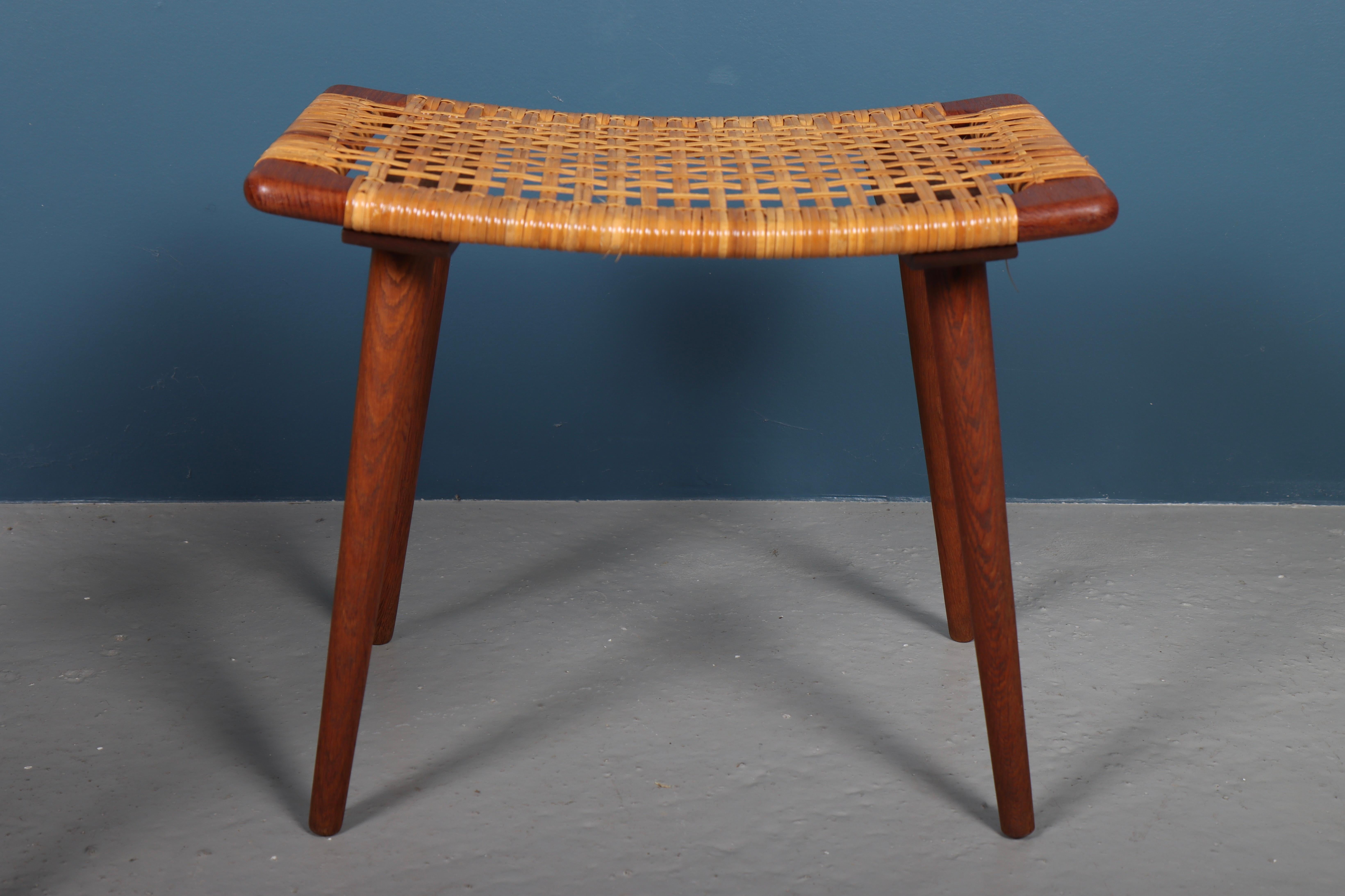 Scandinavian Modern Pair of Stools in Patinated Teak and Cane, Made in Denmark, 1950s