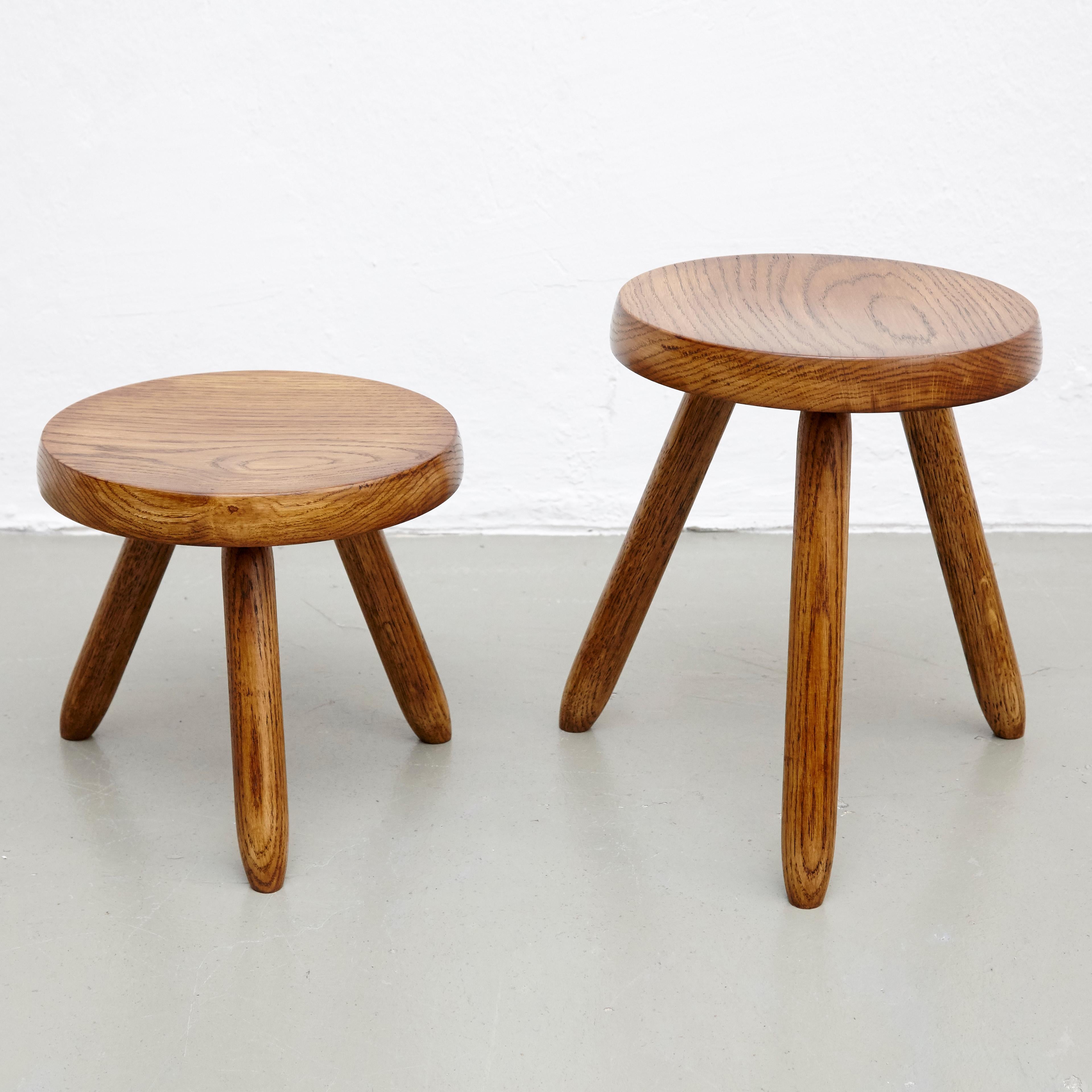 Stools designed in the style of Charlotte Perriand.
Made by unknown manufacturer.

30 x 40 cm
31 x 30 cm

In good original condition, preserving a beautiful patina, with minor wear consistent with age and use. 

Charlotte Perriand