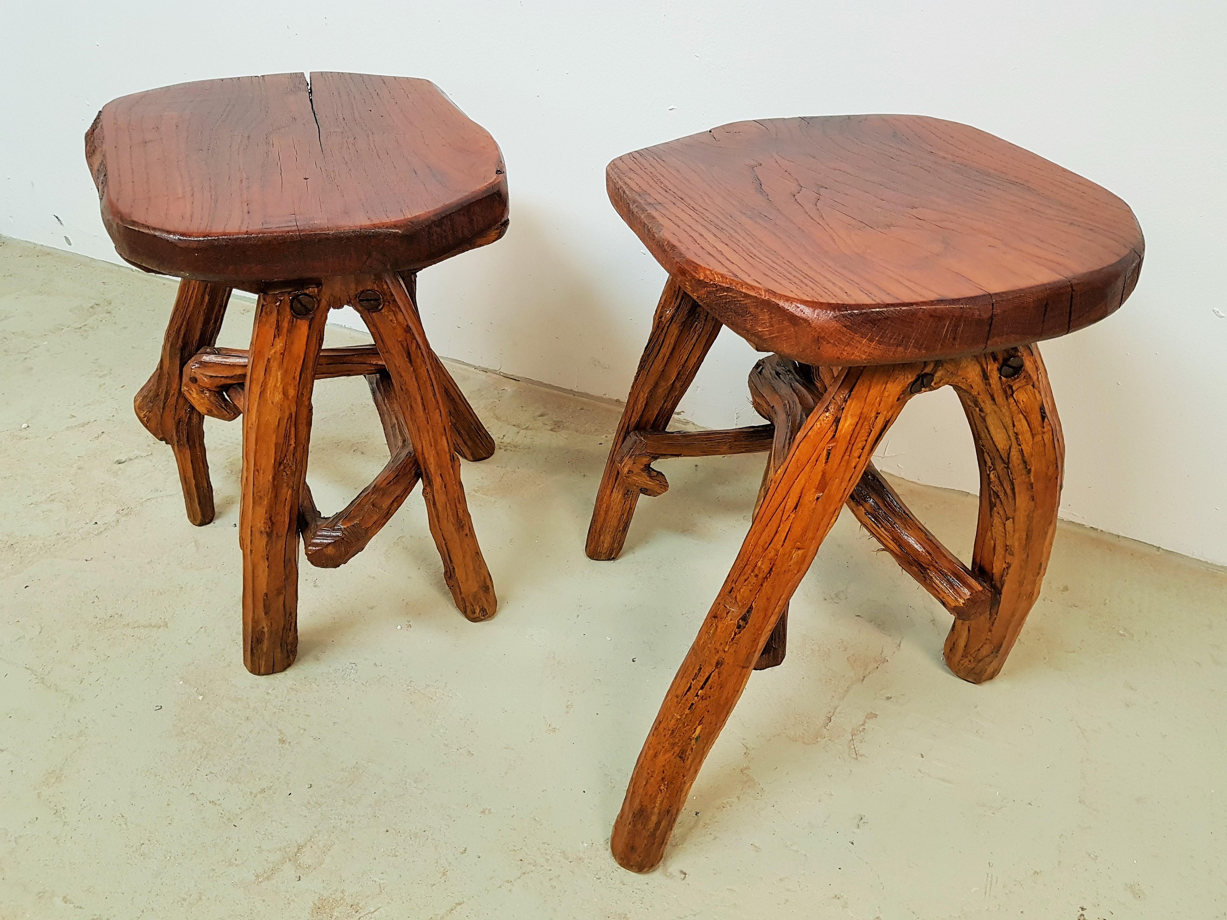 Pair of stools Primitive rustic Brutalist, France 1960s. cottagestyle. 

Massive, solid and stabile. Perfect vintage condition.

Free shipping anywhere in the world.