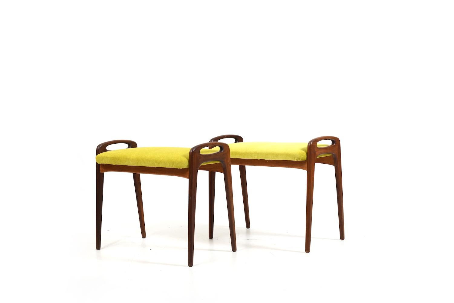 Pair of danish stools / piano benches by Johannes Andersen for Uldum Møbelfabrik. Denmark 1960s. Seats new upholstered with KVADRAT fabric in lime green. 