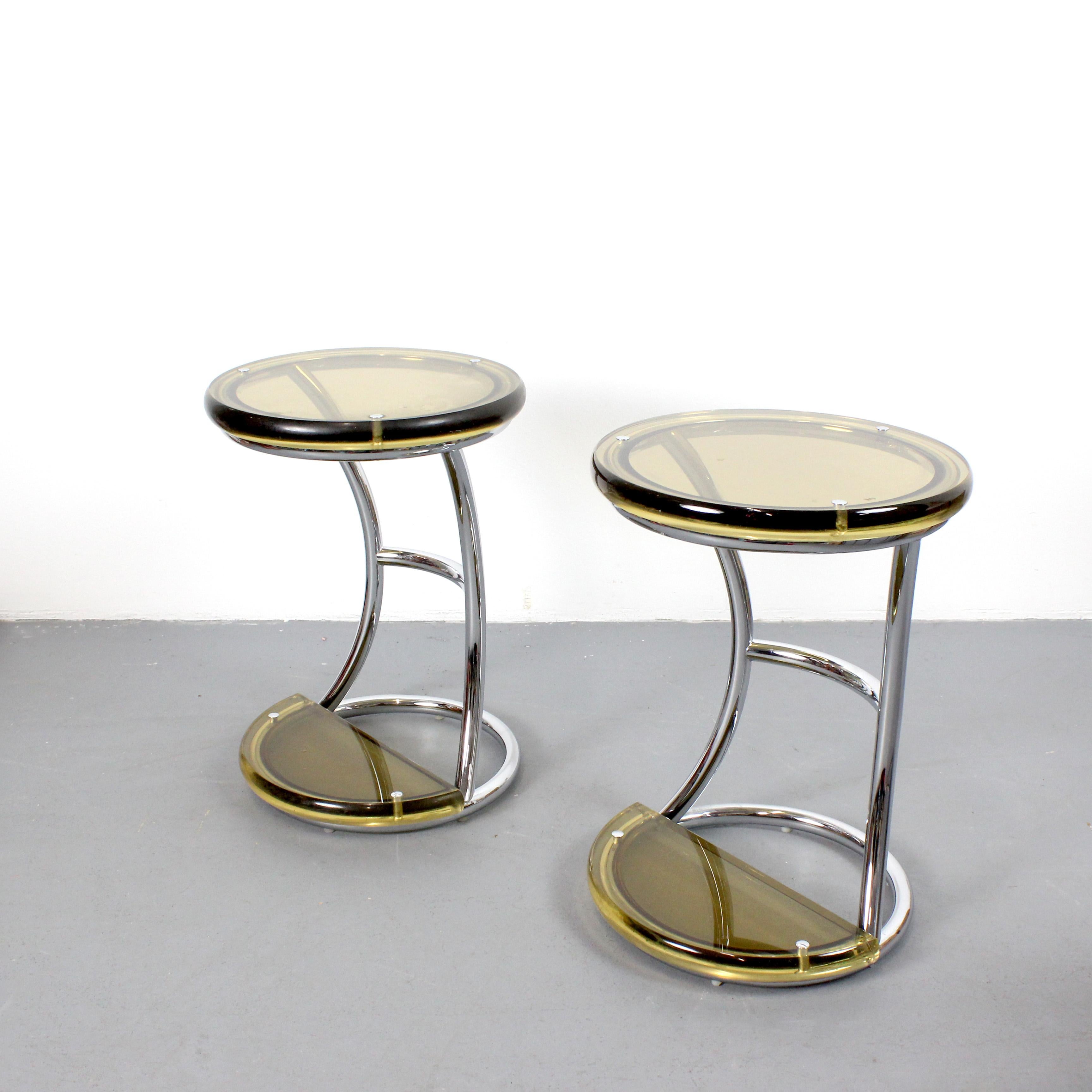 Pair of stools/side tables with a tubular, chrome-plated metal frame and honey-colored methacrylate tops - c. 1970