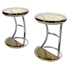 Pair of stools with a chrome-plated tubular frame and honey-colored methacrylate
