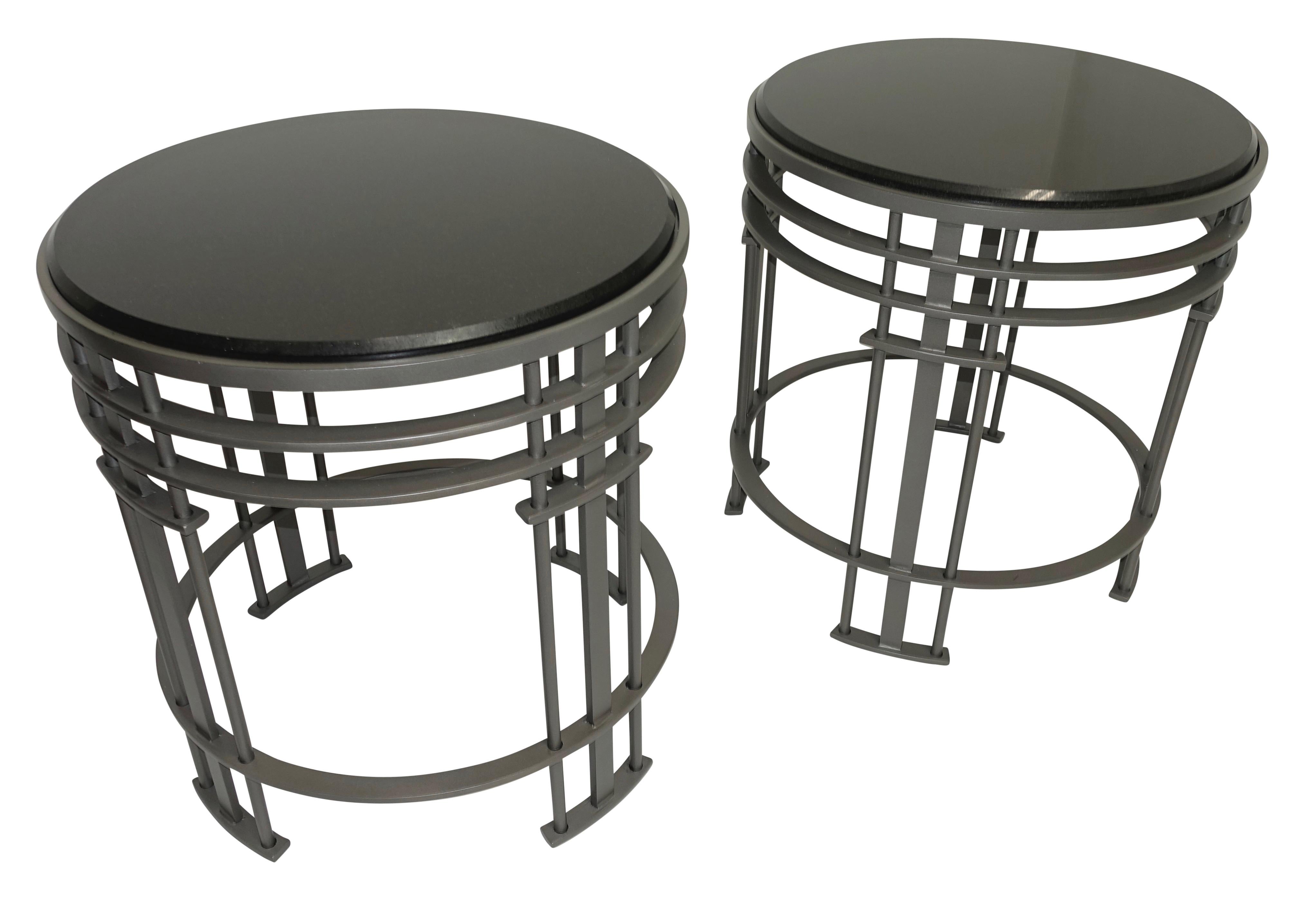 A pair of midcentury side tables, having bead blasted steel bases and a beveled black granite top. American, 1930s-1940s.
In excellent condition.


 