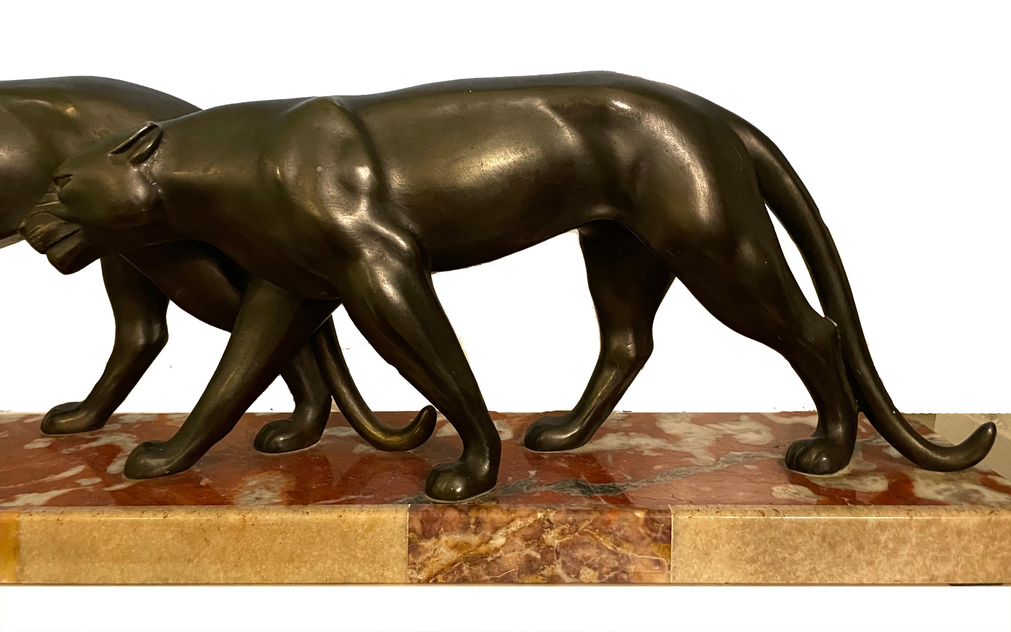 Pair of striding panthers en vente 1