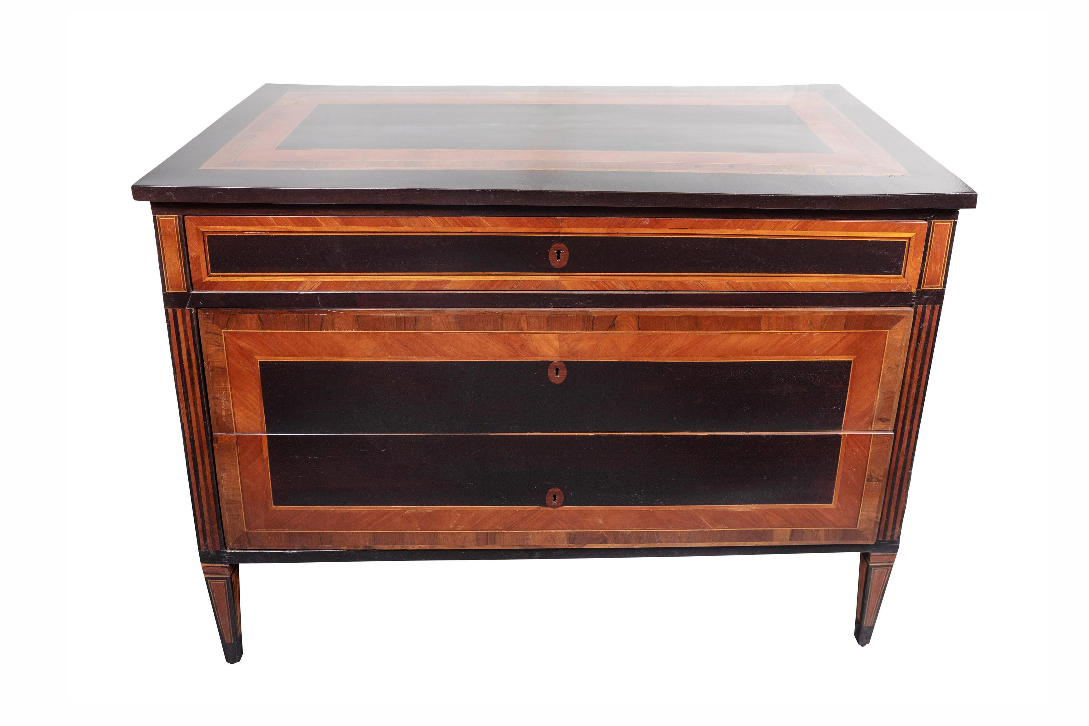 Two, large, 19th century, Tuscan, three-drawer commodes with beautiful, walnut and ebonized wood veneer and inlay throughout. Faux paneling on all three sides. Each on tapered legs.