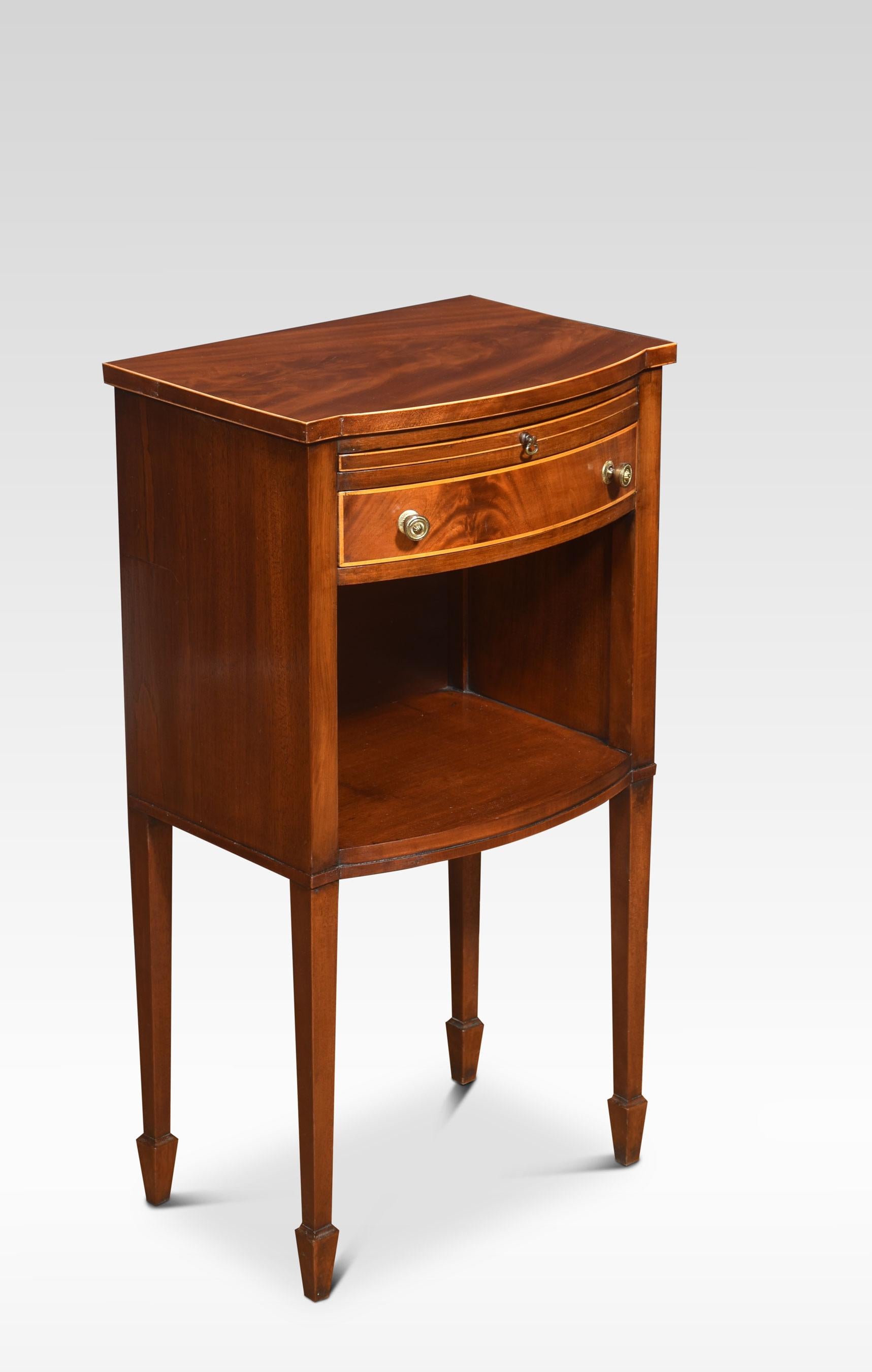 Pair of string inlaid bow front bedside tables, each having a brush in slide above a single short drawer to a cupboard below all raised up on square tapering supports terminating in spade feet.
Dimensions
Height 30 Inches
Width 16 Inches
Depth 11.5