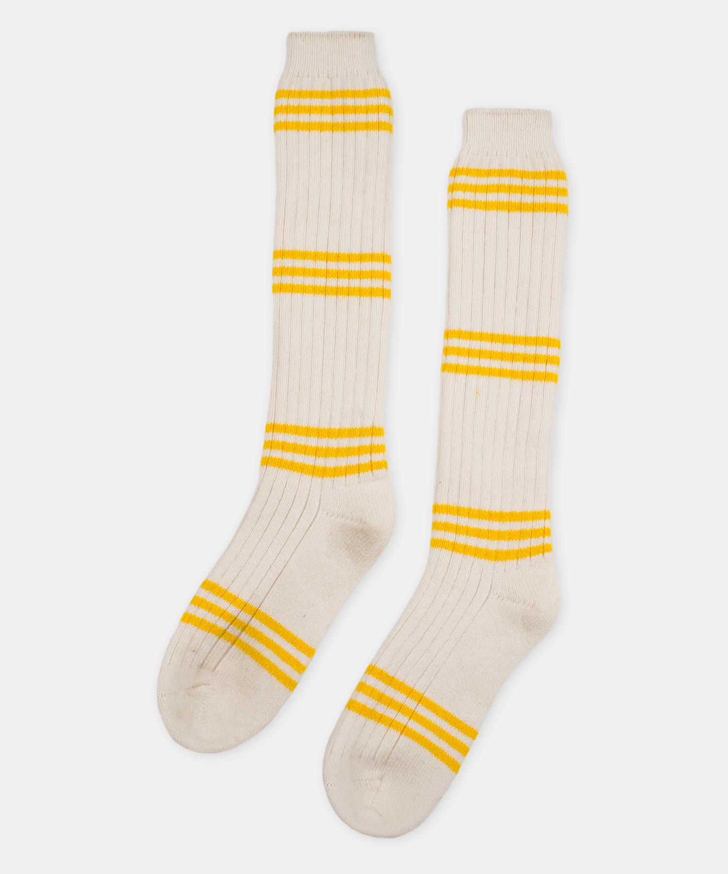 Striped Cashmere tube socks by Saved, New York

100% Cashmere. A luxurious take on a classic, calf-high athletic sock. One size. Stripe available in red and yellow. Please inquire for availability and lead time.