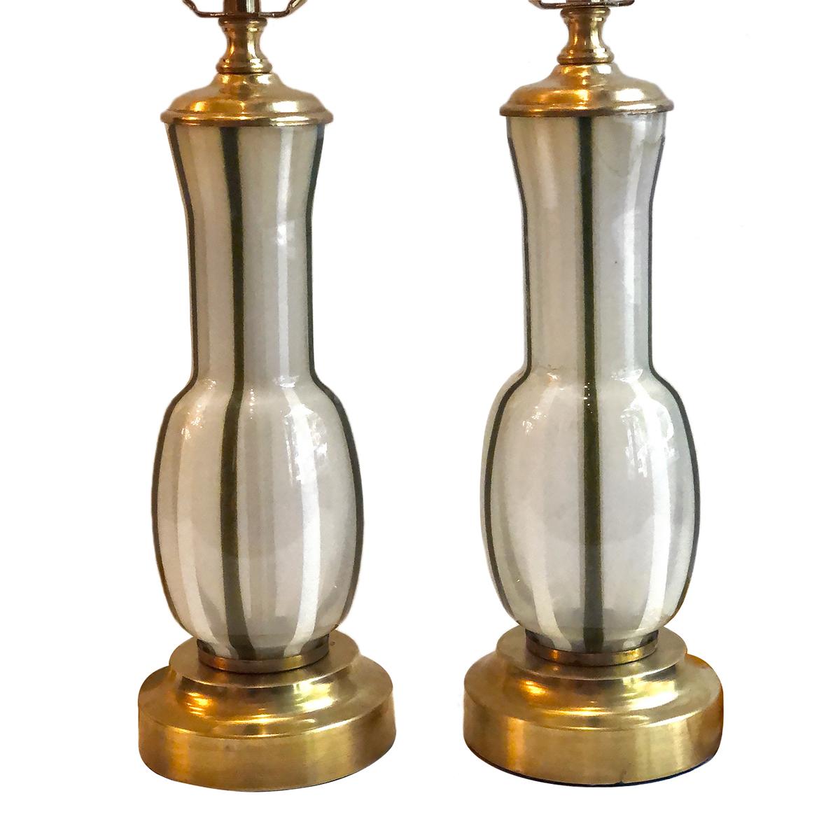 A pair of 1940s Italian hand blown striped glass lamps with gilt bases.

Measurements:
Height of body 11