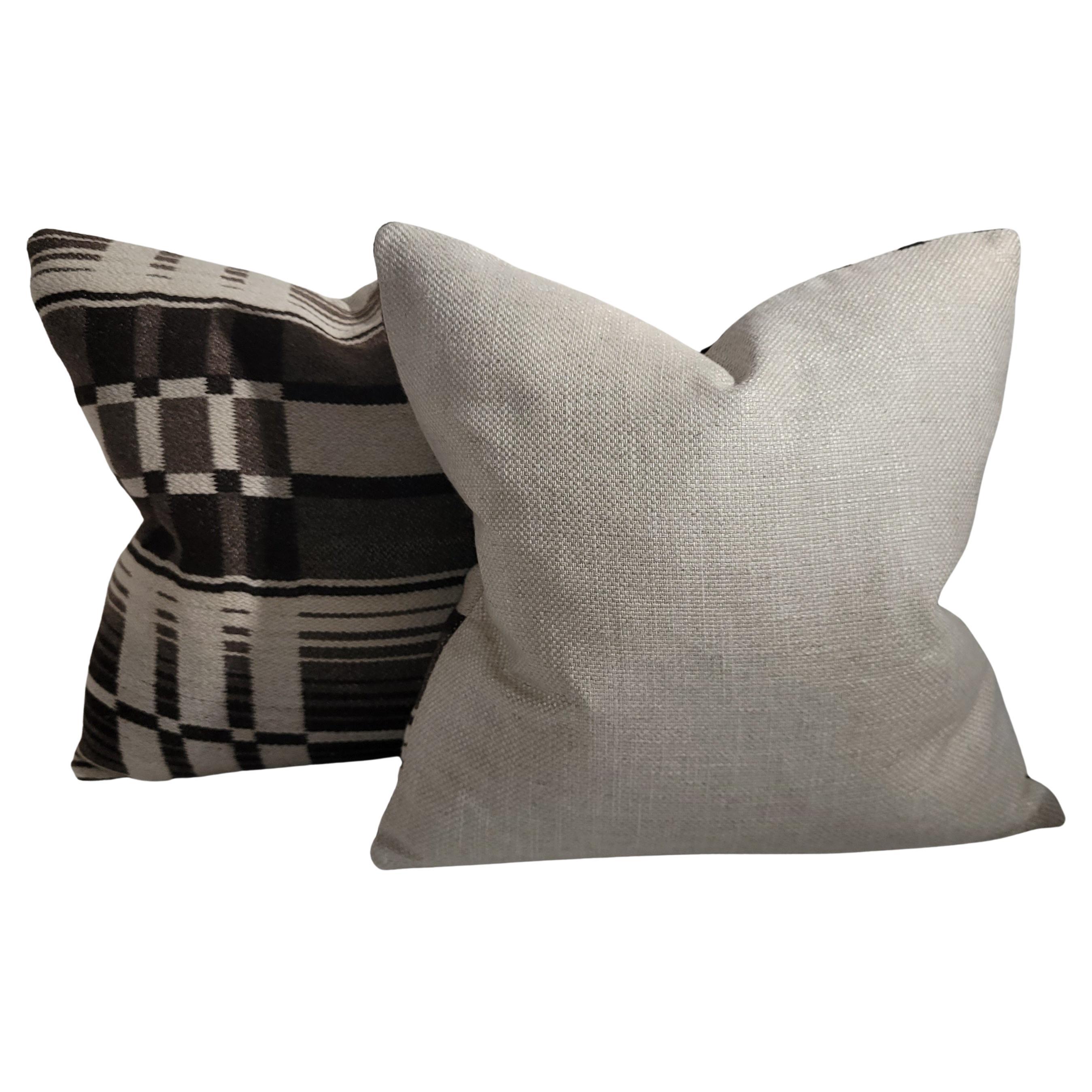 Pair of White and Browns wool plaid pillows. Beautiful design with intersecting striped throughout. The backing is made from a vintage linen fabric with down and feather custom inserts.