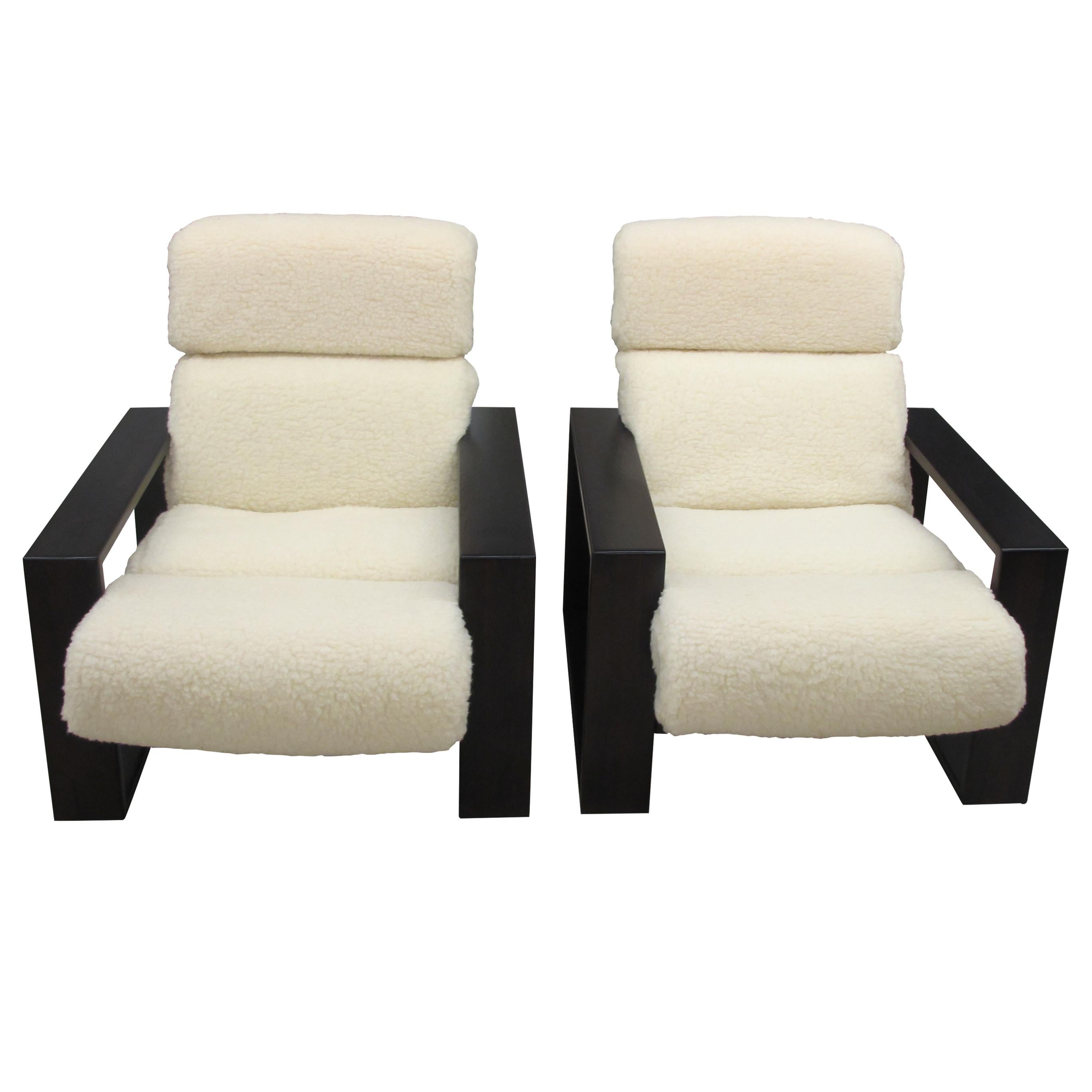 1970s Large pair of Structural armchairs with a wooden frame made for Peem Oy of Finland. The chairs are very comfortable with large armrests and great back support. Each armchair is made of three pieces; the frame, the cushion support which hooks