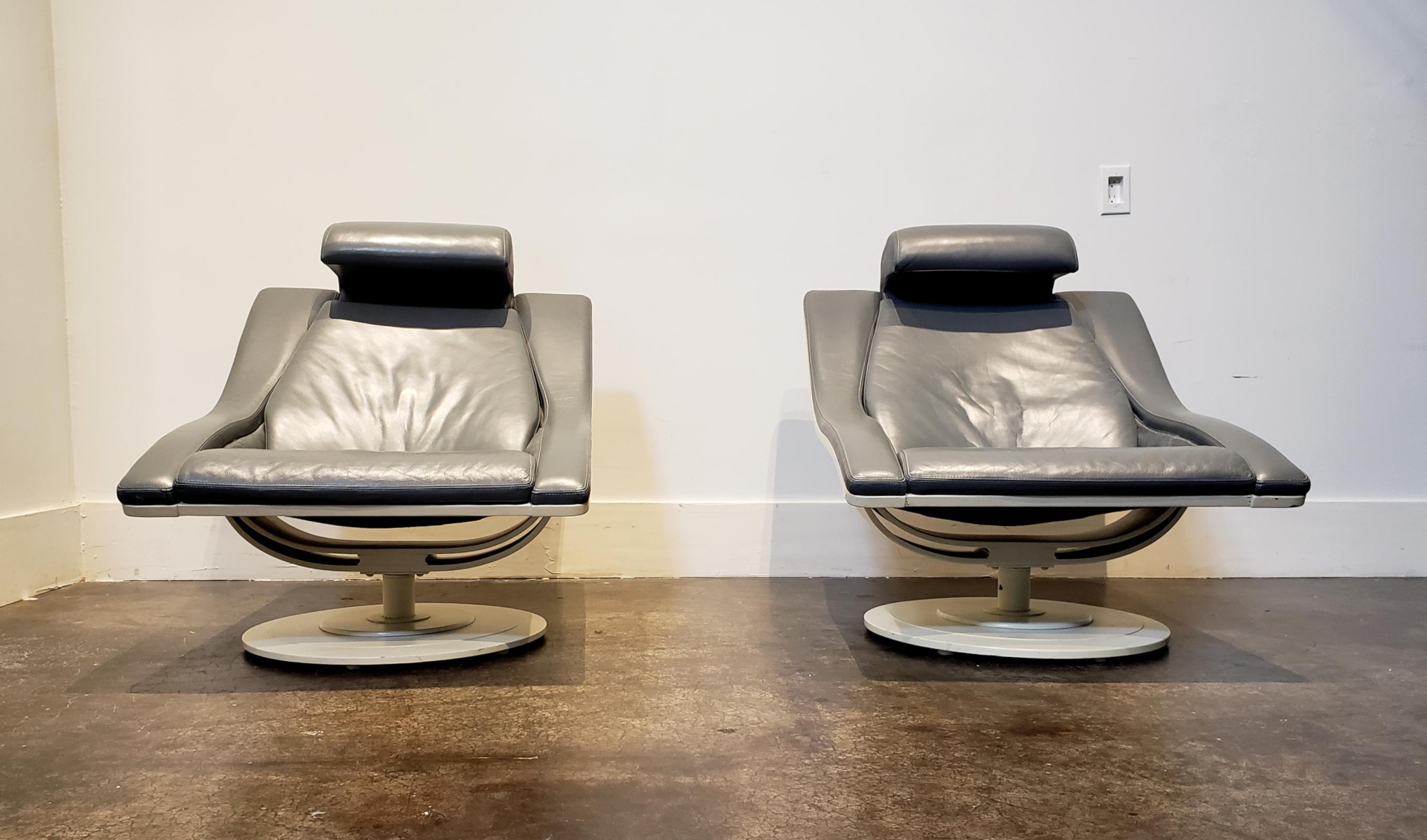 European Pair of Structural Mid-Century Modern Leather Swivel Lounge Chairs For Sale
