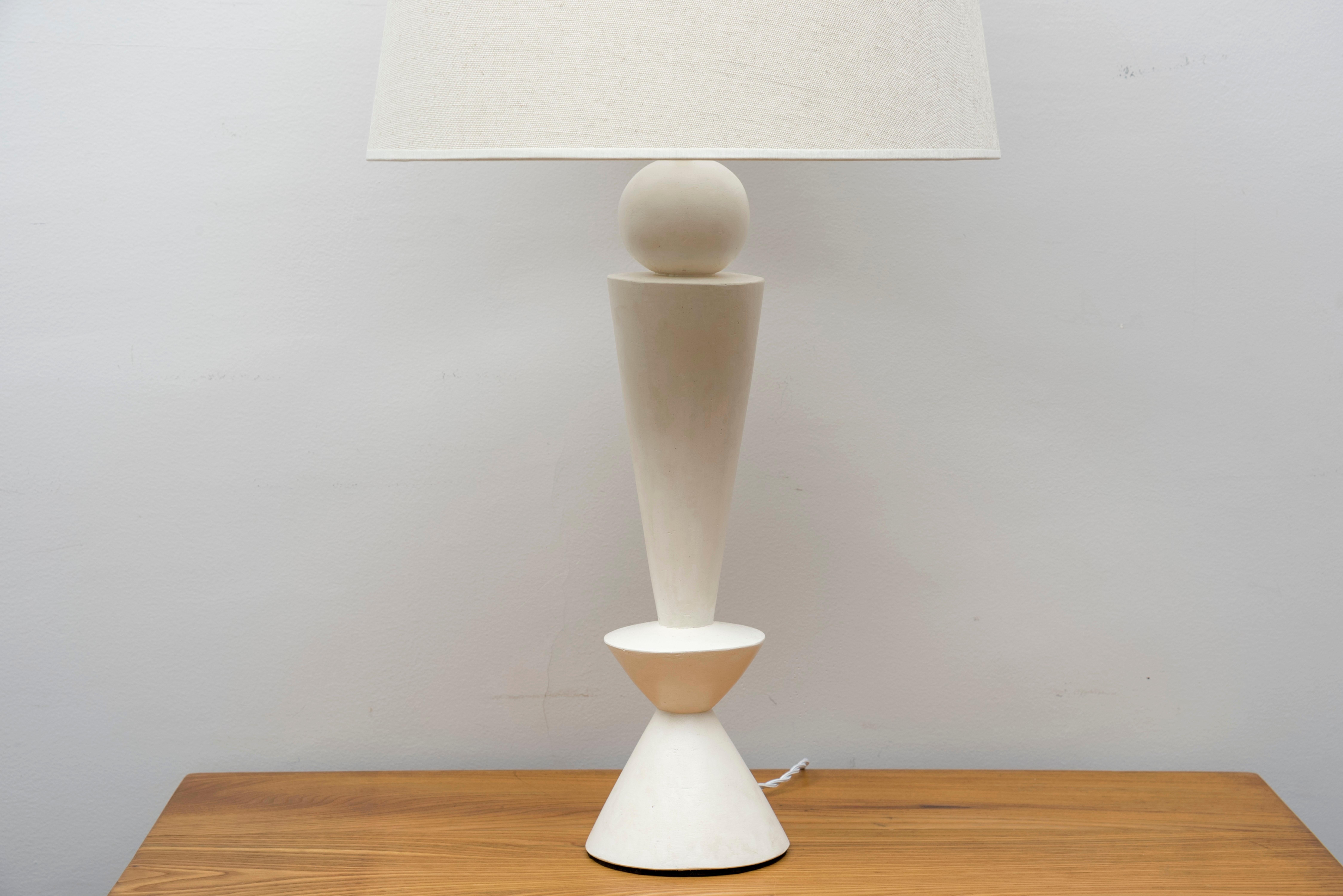 A pair of stuccoed plaster lamps, inspired by Jean-Michel Frank
Model: DIabolo
France, contemporary creation.

Dimensions:
Height total: 79.5 cm (31.1 inches)
Height plaster foot: 47.5 cm (18.5 inches)
Diameter 42 cm (16.5 inches).
 