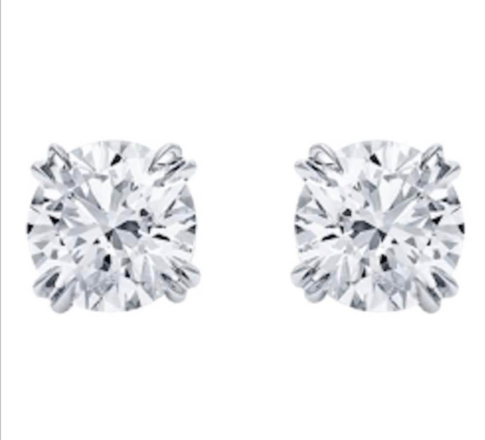 Round Cut Pair of Stud Earrings Round Diamond 2.10 and 2.08 Carat H Vvs2 on Platinum For Sale