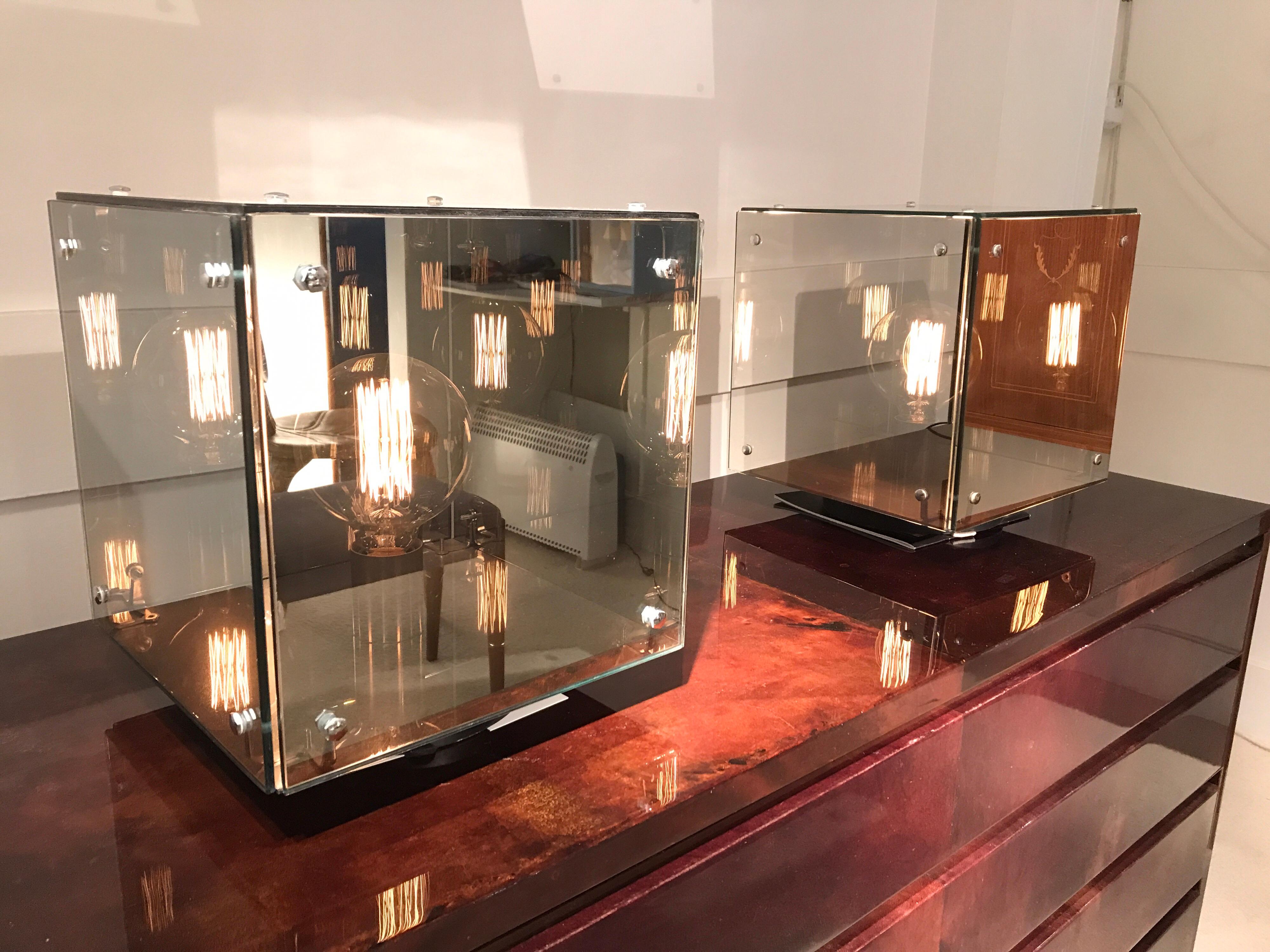 Pair of Studio Arditi mirror lamps with chrome details.
Screws are different in lamps but same sizes
italia, 1970.