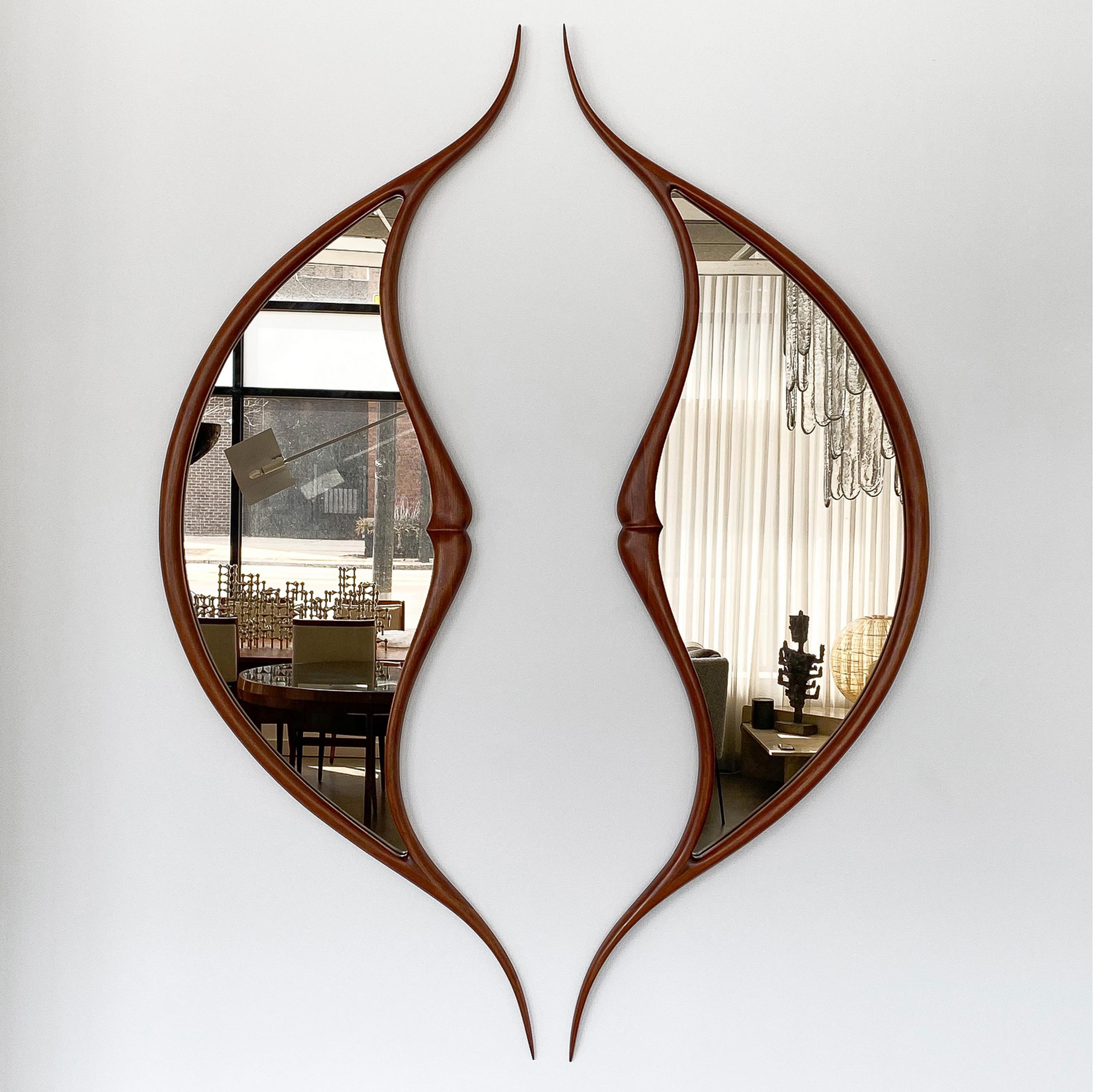 These stunning large wall mirrors are emblematic of the American Studio Craft Movement, showcasing the unique talent of sculptor Mark Levin, USA circa 1970s. Each piece of this pair stands as a testament to the artistry and vision that marked this