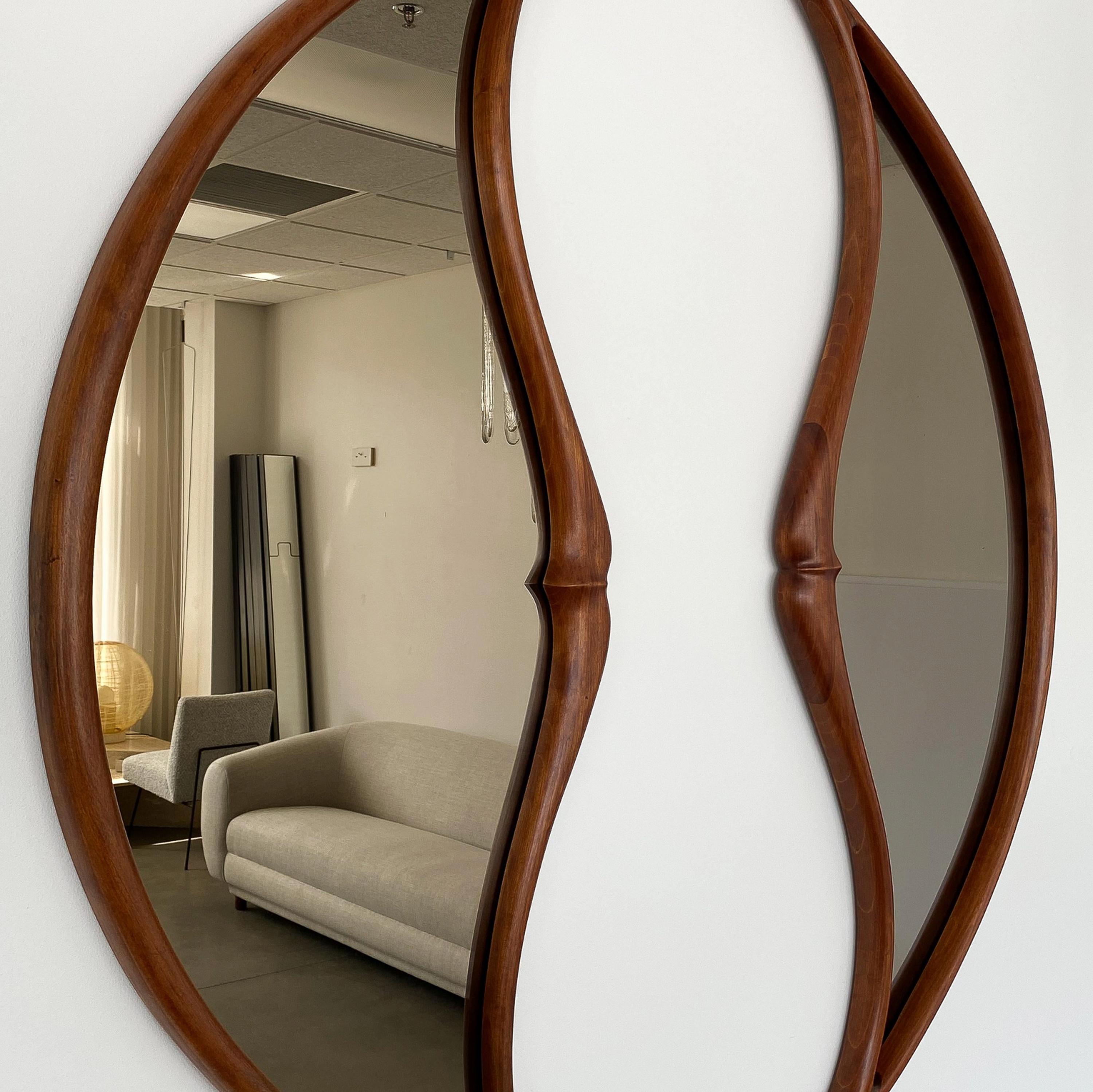 Pair of Studio Craft Movement Carved Sculptural Walnut Wall Mirrors, Mark Levin In Good Condition For Sale In Chicago, IL