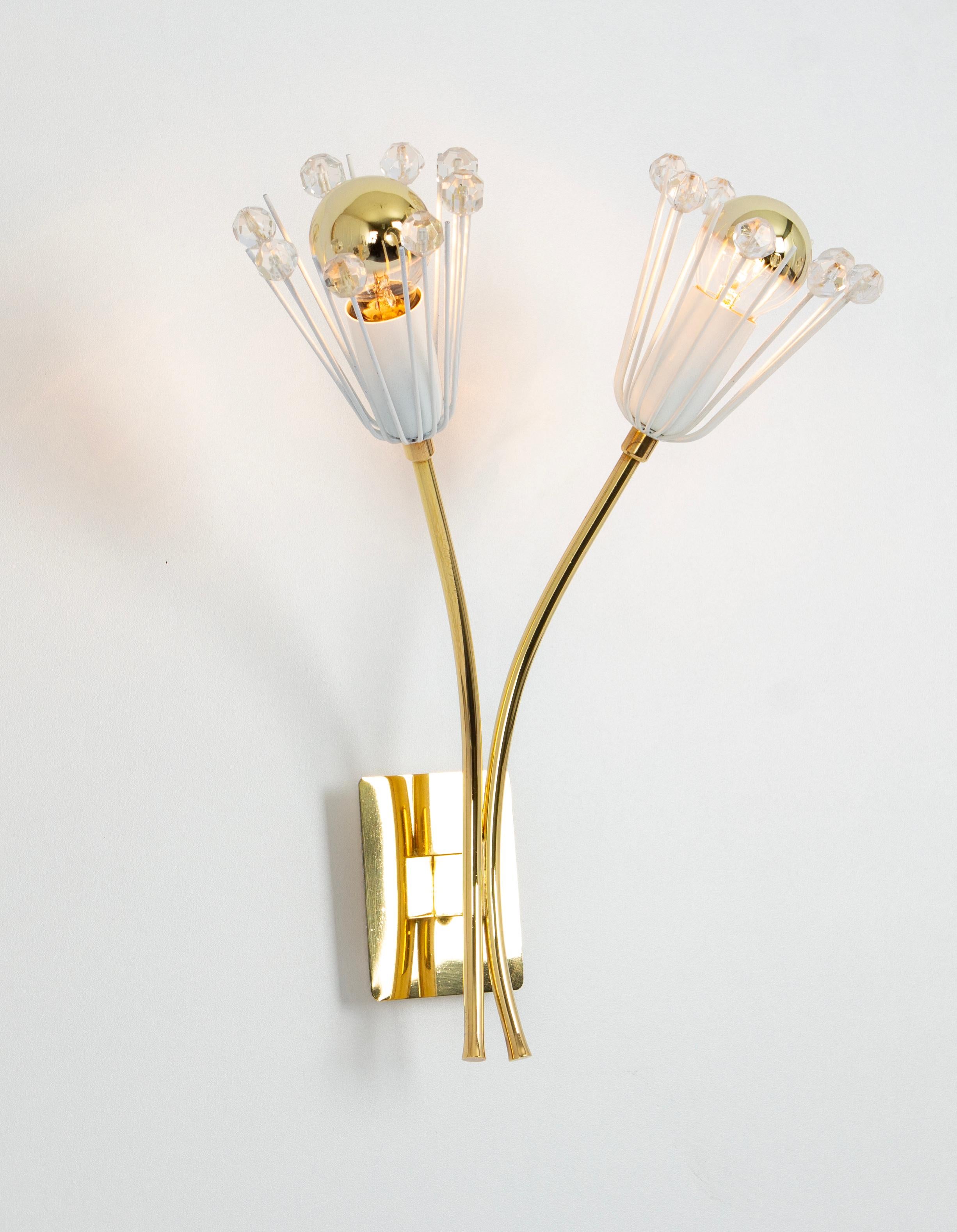 Pair of Stunning Brass and Glass Wall Sconces designed by Emil Stejnar, 1960s
High quality and in very good condition. Cleaned, well-wired and ready to use.


Each sconce requires 2 x E14 small bulbs with 40 W max each.
Light bulbs are not included.