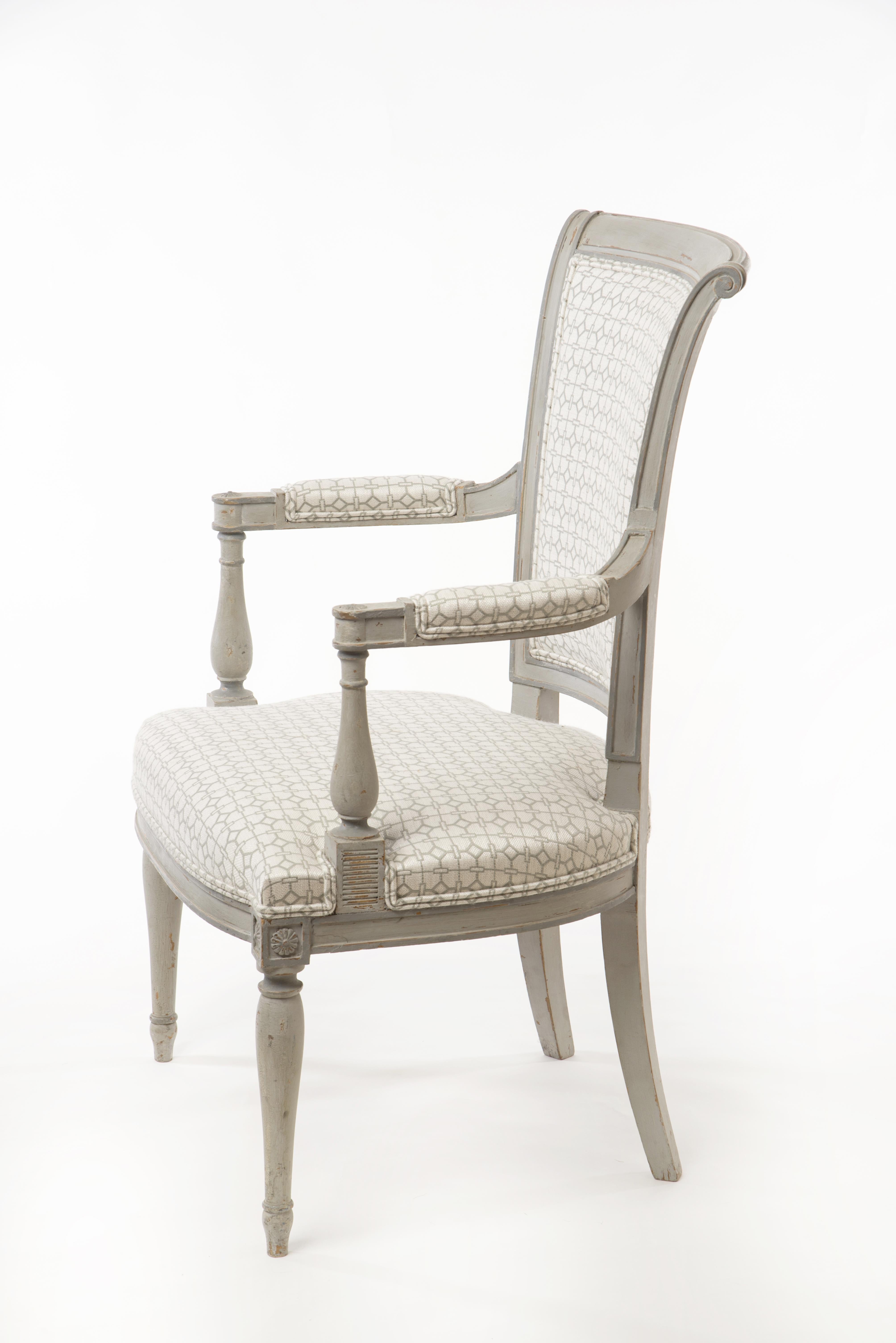 This stunning pair of fauteuils in the style of Directoire are beautifully crafted in the early 20th century. Upholstered with an exclusive fabric from the Meissen Home Collection these fauteuils are guaranteed to draw attention. The chairs are in