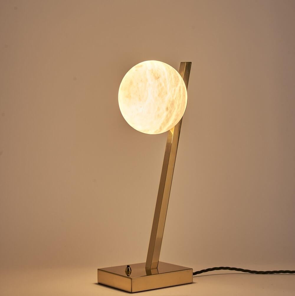Galvanized Pair of Stunning Italian Alabaster Sphere Offset Table Lamp, in polished brass For Sale