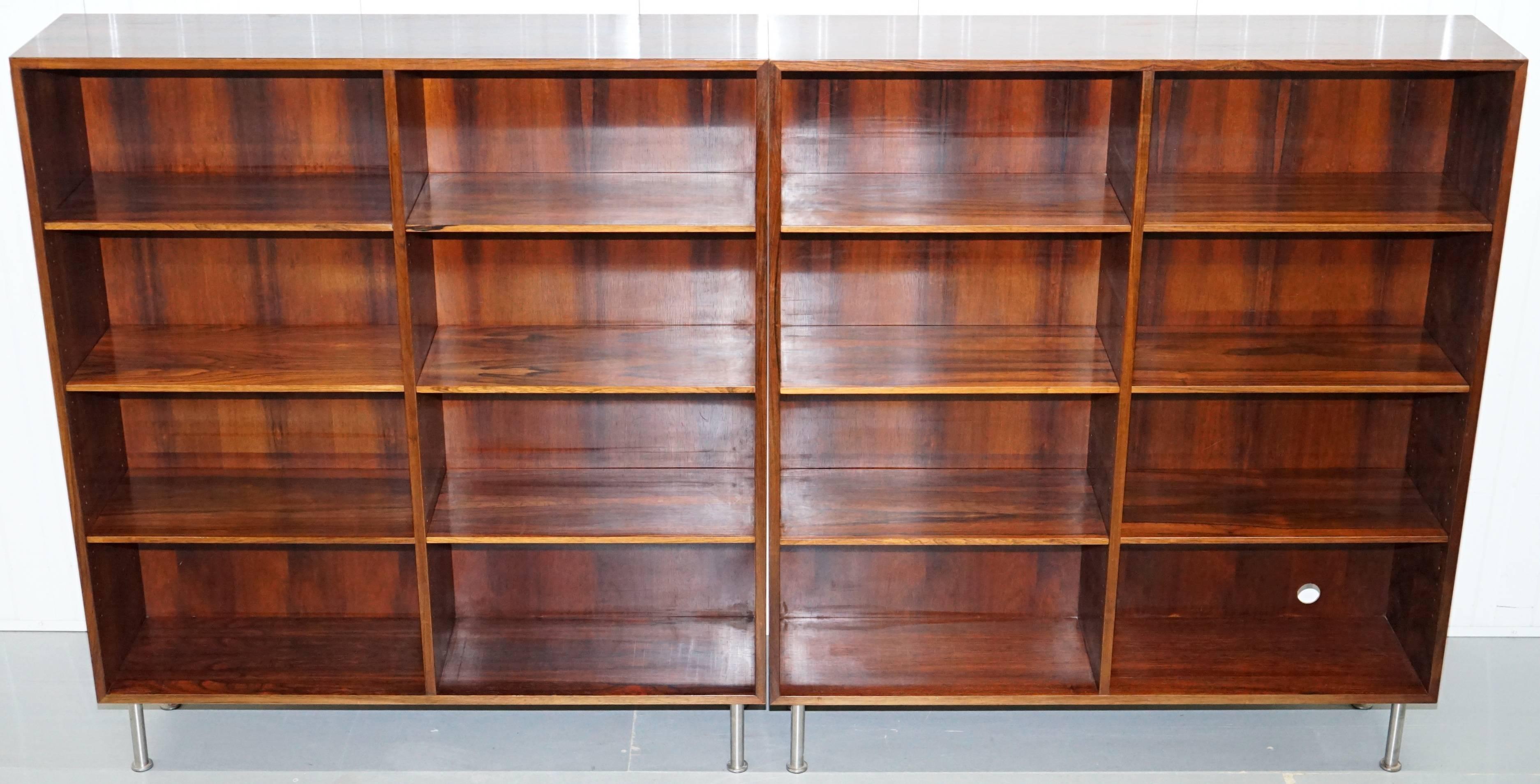 We are delighted to offer for sale this lovely pair of fully stamped Omann Jun Møbelfabrik Brazilian wood open bookcases

A good looking and expertly made pair using the finest Brazilian wood veneers available in the 1960s

The shelves are all