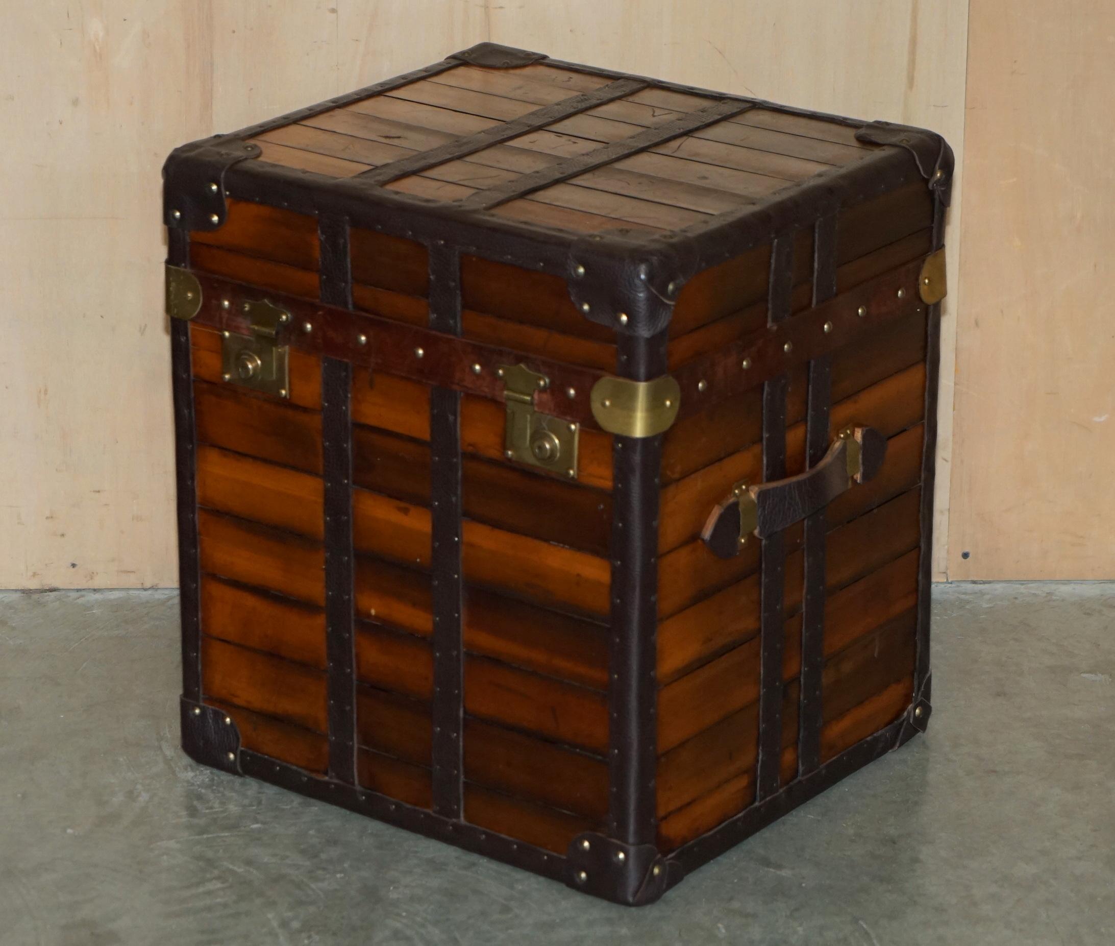 Royal House Antiques

Royal House Antiques is delighted to offer for sale this lovely pair of vintage side table sized luggage steamer trunks made from slatted wood and leather strapped then finished with Made in England brass locks

Please note the