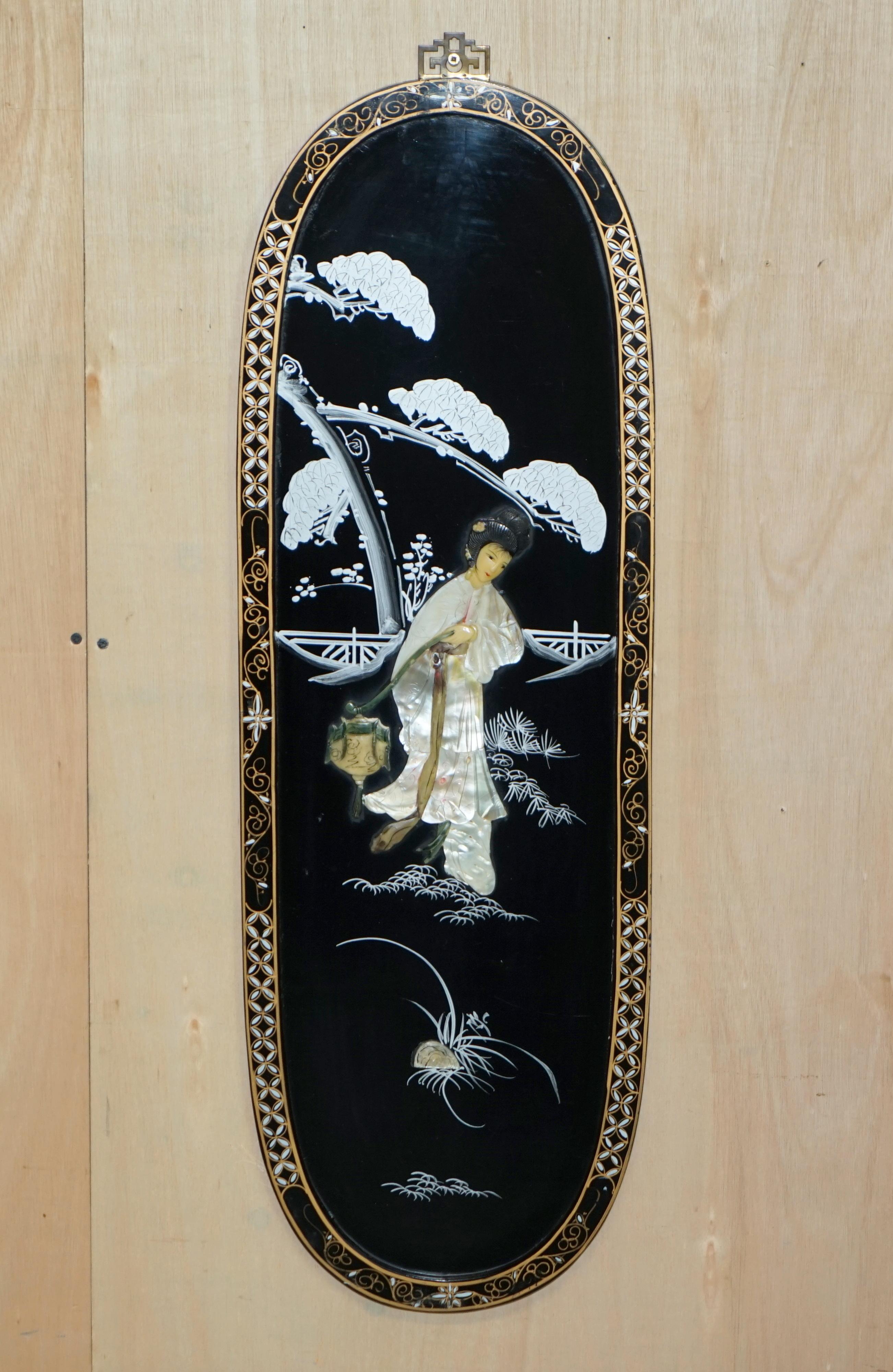 We are is delighted to offer for sale this stunning pair of vintage circa 1940s Chinese chinoiserie wall plaques depicting Geisha girls in soapstone and mother of pearl

Please note the delivery fee listed is just a guide, it covers within the M25