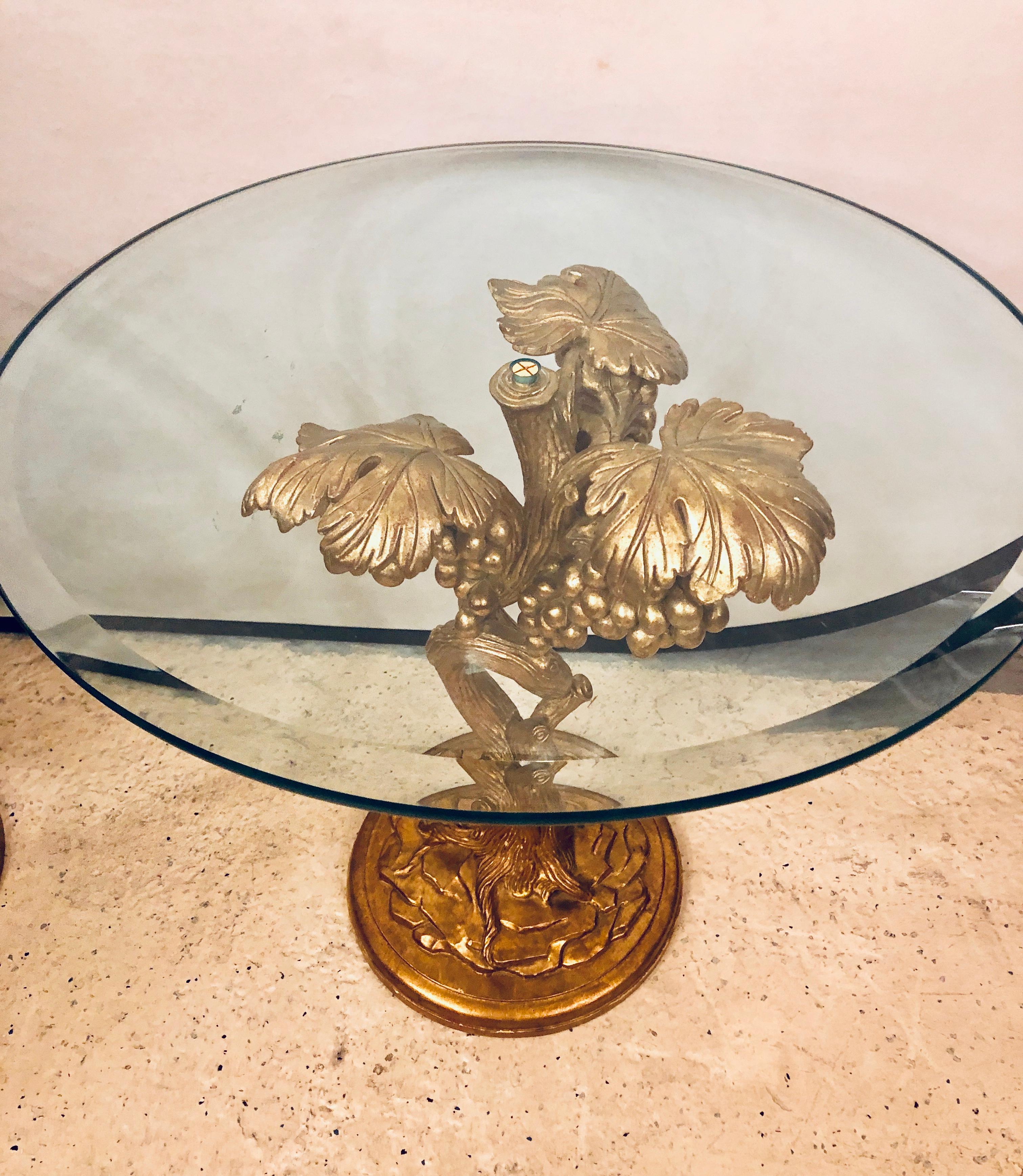 Pair of stylish Italian carved side tables - Grapes on the vine design. These fine and highly decorative side or end table each have a flowing vine with wonderfully detailed grapes hanging from the vine in a gilt gold finish. Each supporting a