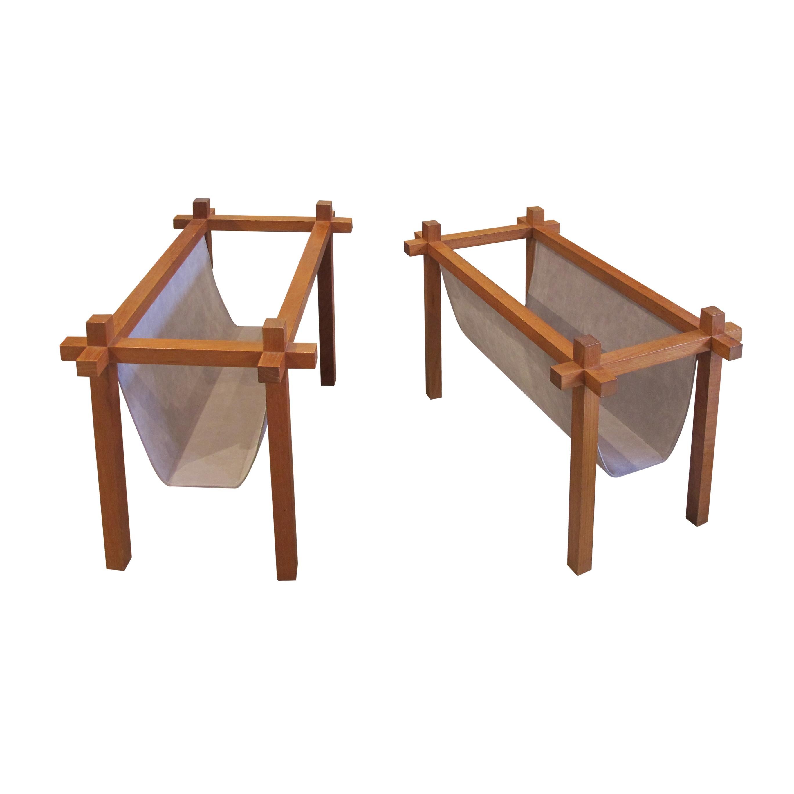 A pair of mid-century stylish teak and fabric magazine racks by Skjøde Skjern, Denmark, 1960s. The fabric was recently changed to a suede-like fabric in a mushroom colour, easy-care and very resistant.

Size: H44 cm x W61 cm x D33 cm
