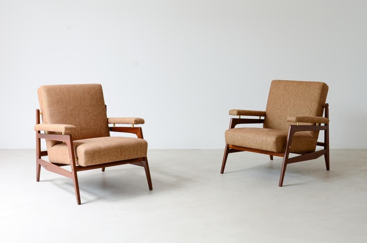 COD-2448
Pair of stylish modernist armchairs in wood and upholstery with nice brass spacers.

Italian manufacture around 1955.


