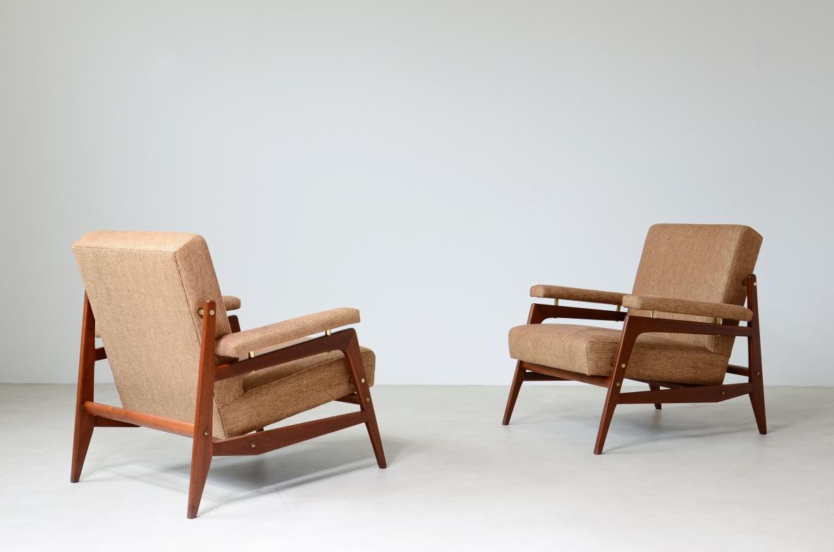 Pair of stylish modernist armchairs in wood and upholstery  1
