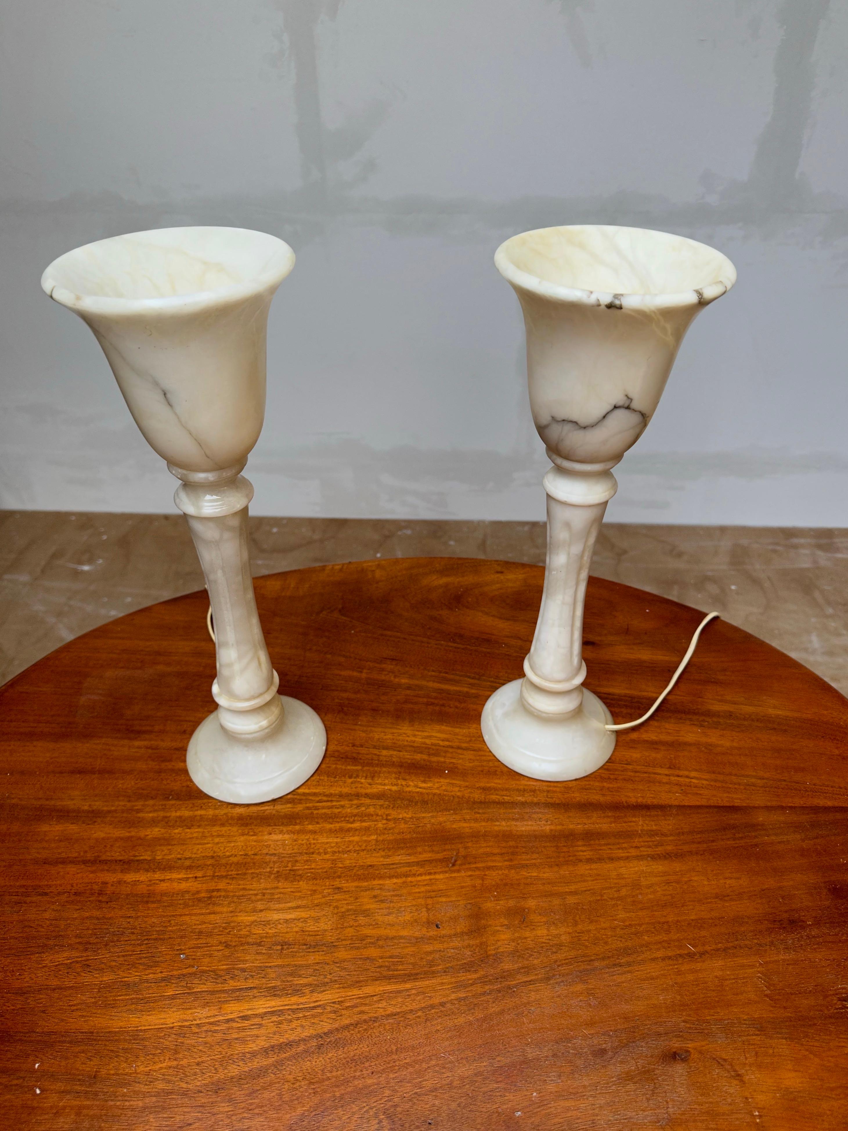 Great pair of midcentury made alabaster table or desk lamps in a timeless classical style.

If you are looking for a great shape and practical Size pair of table lamps to grace your living space then these natural mineral stone lights could be