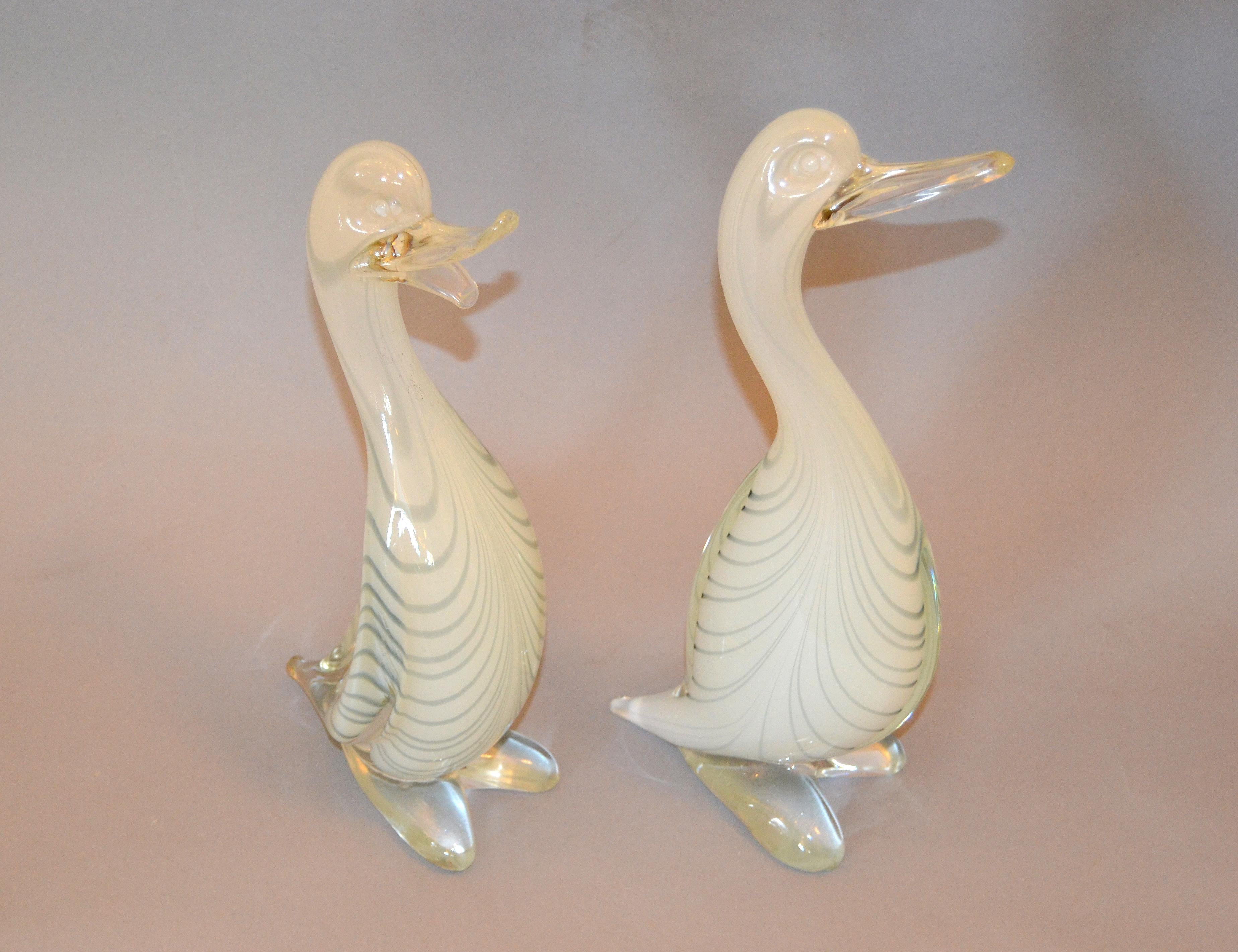 Beautiful 'Him and Her' Duck in hand blown Murano art glass ducks attributed to Archimede Seguso and made in Italy.
Simply lovely.

Measurements male:
Height 13.5 inches, length 3.5 inches, depth 5.25 inches 
Measurements Female:
Height 12.5