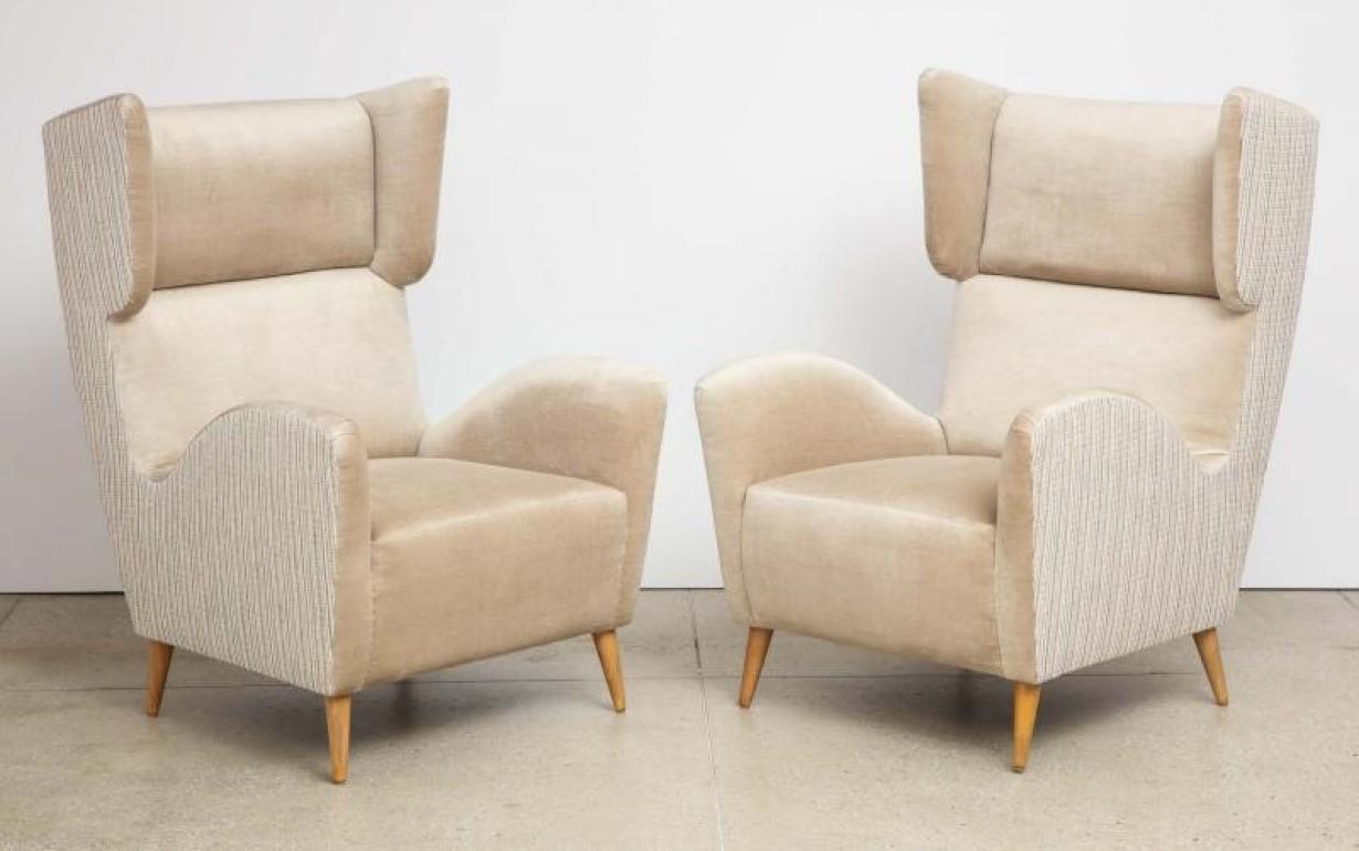 Mid-20th Century Pair of Stylized Wing Chairs