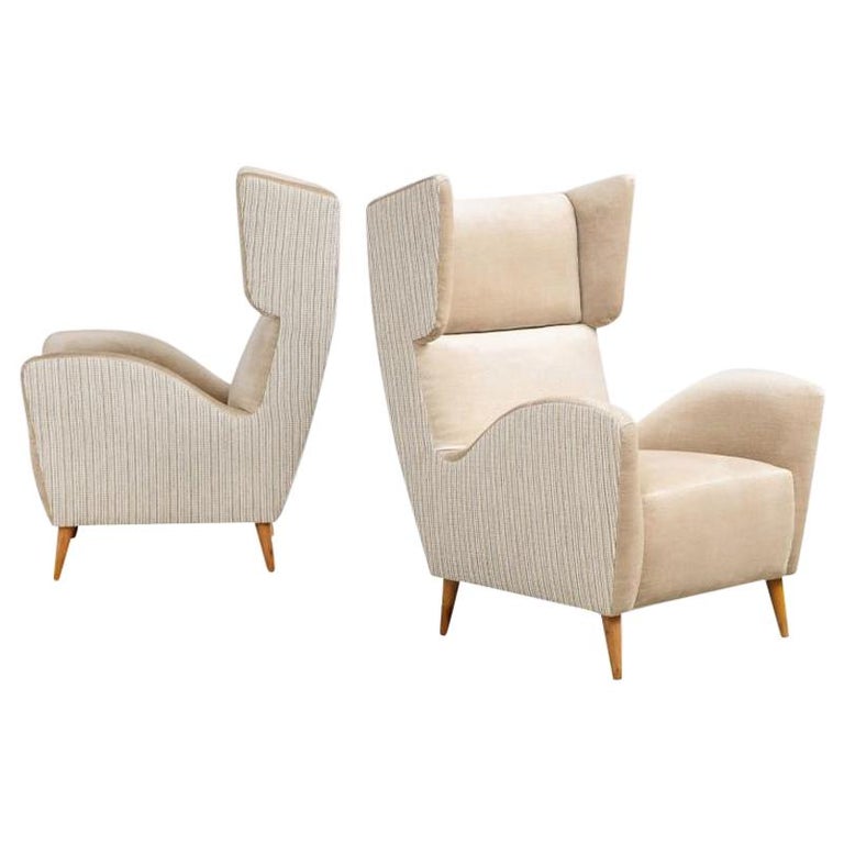 Pair of Stylized Wing Chairs For Sale
