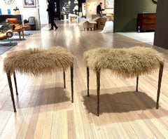 Pair of "suave" benches in Mongolian fur and hammered patined Bronze