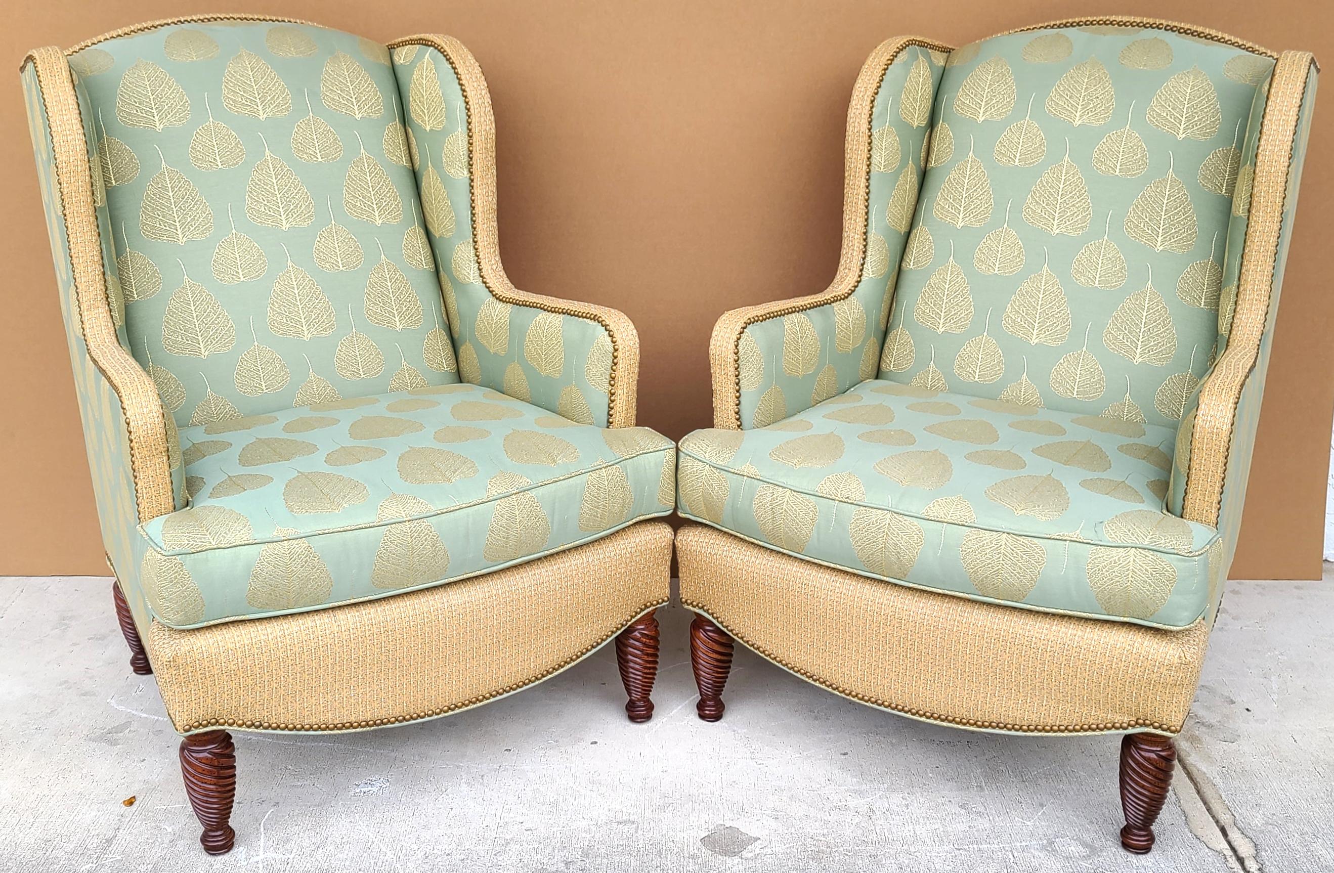 Offering one of our recent palm beach estate fine furniture acquisitions of a
pair of substantial chippendale wingback armchairs by Hekman Woodmark
Very large and heavy chairs featuring burnout satin cotton with velvet leaf design, and brass nail